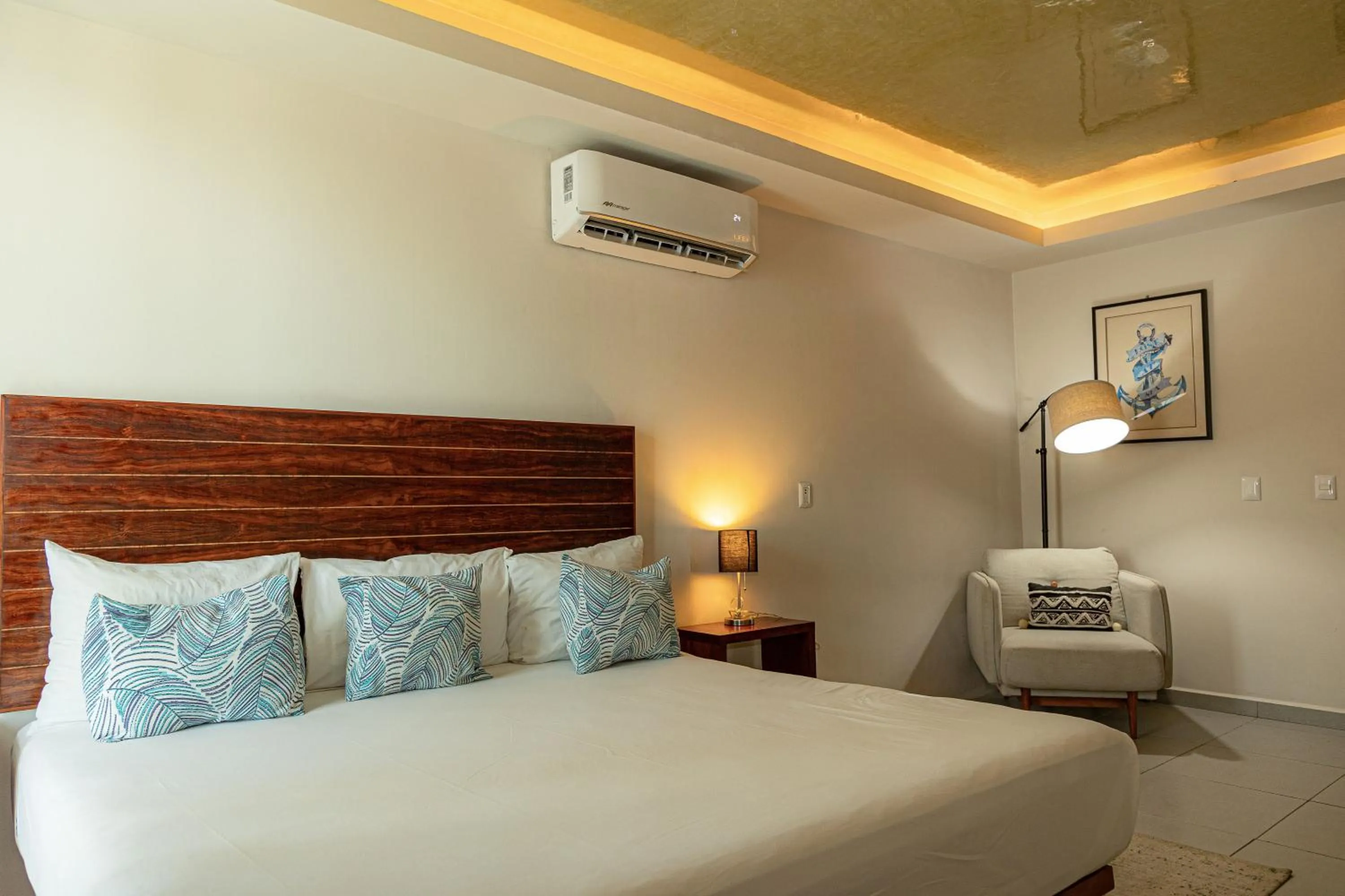 Bed in Aquastar Unique Hotel & Apartments Mahahual