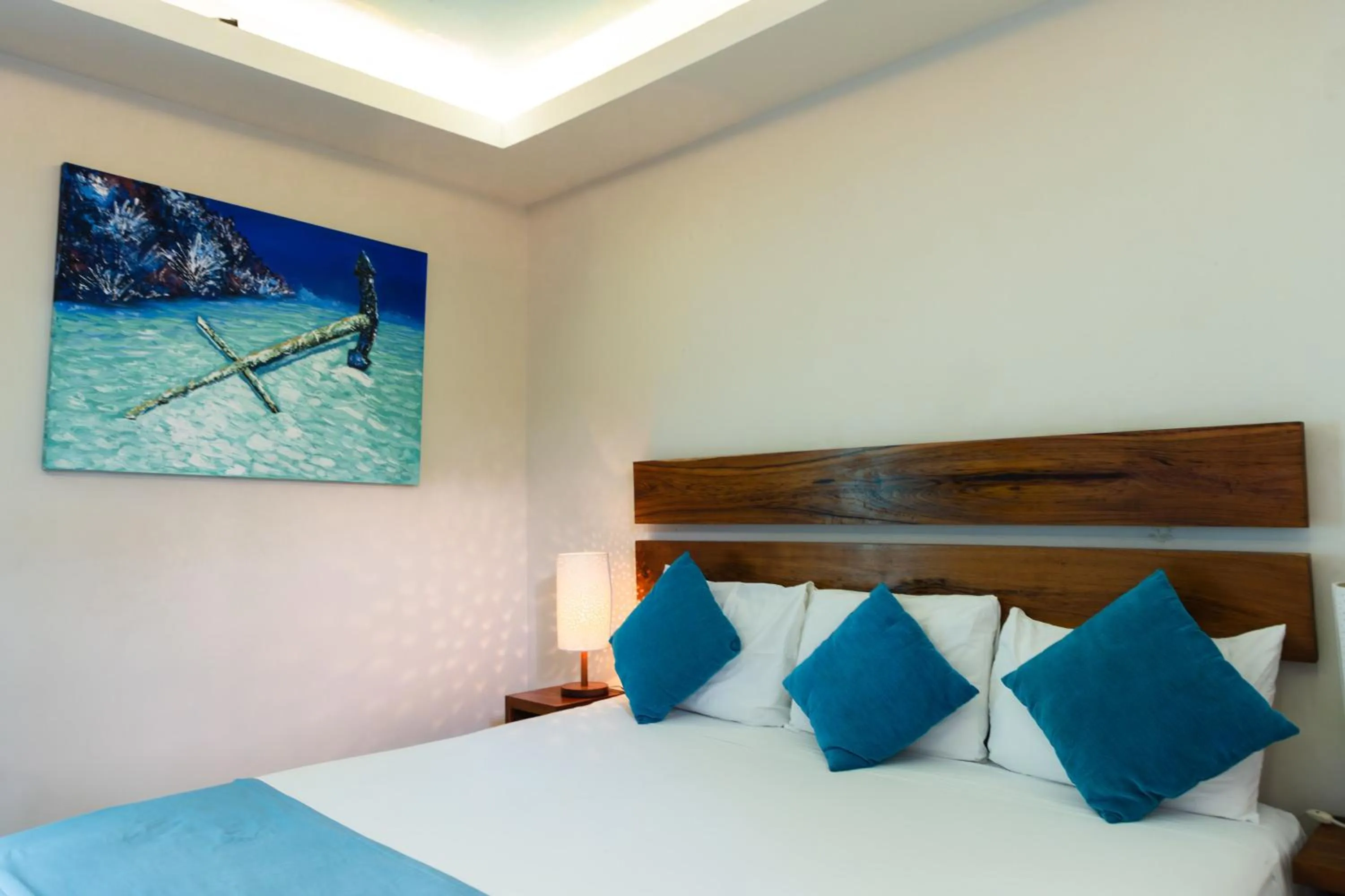 Bed in Aquastar Unique Hotel & Apartments Mahahual