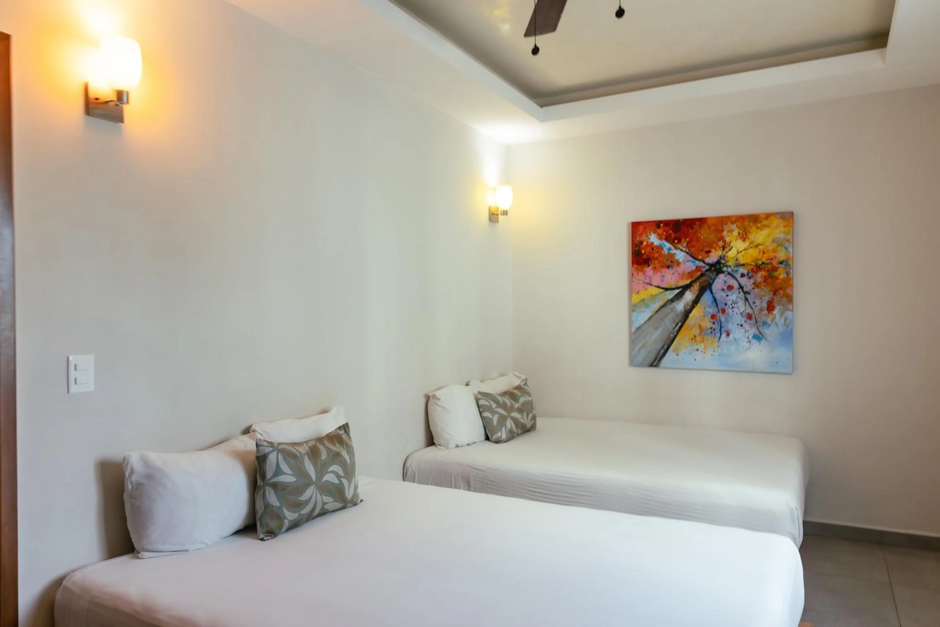 Bed in Aquastar Unique Hotel & Apartments Mahahual