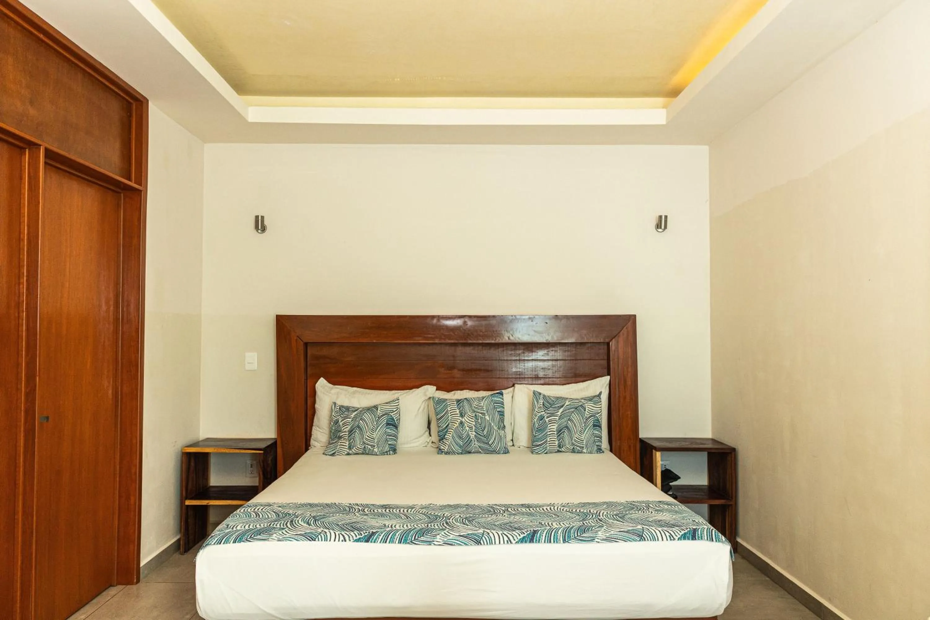 Bed in Aquastar Unique Hotel & Apartments Mahahual