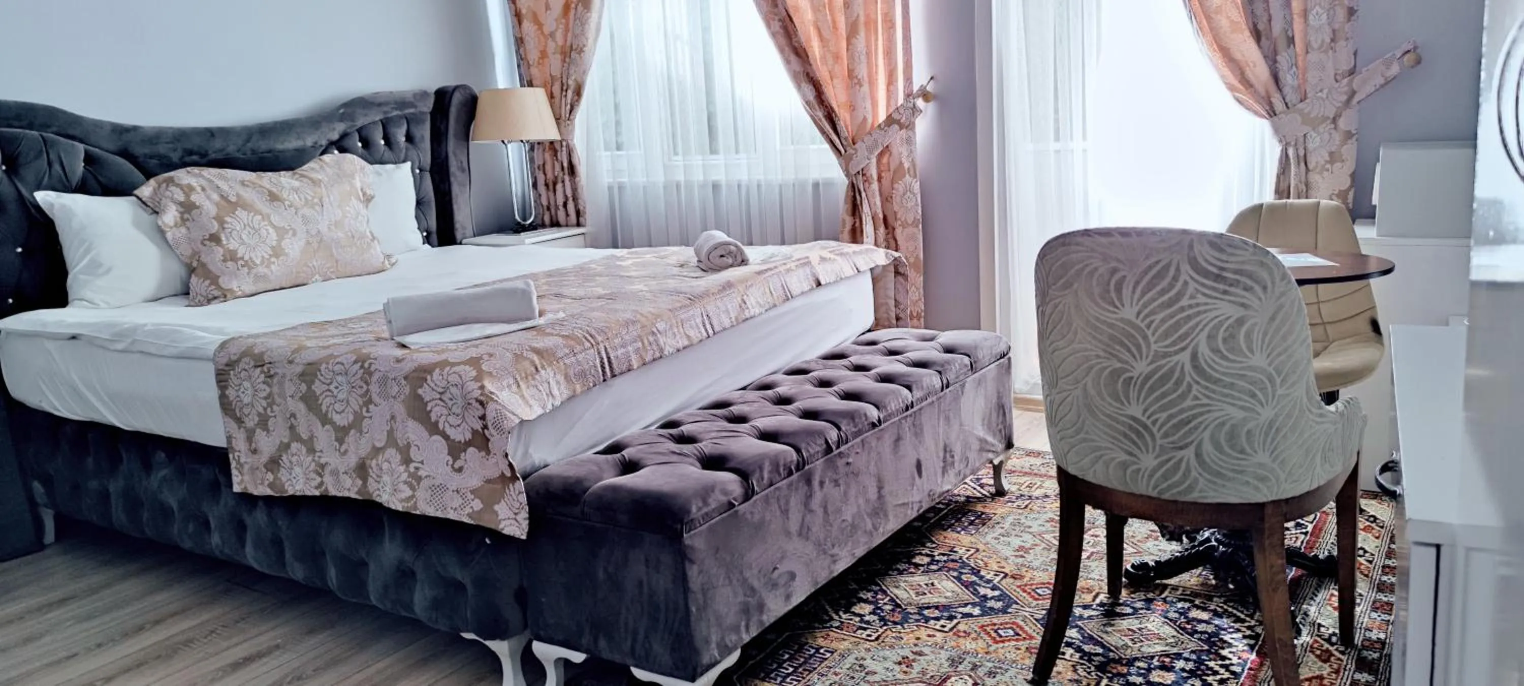 Bed in La Mer Boutique Hotel