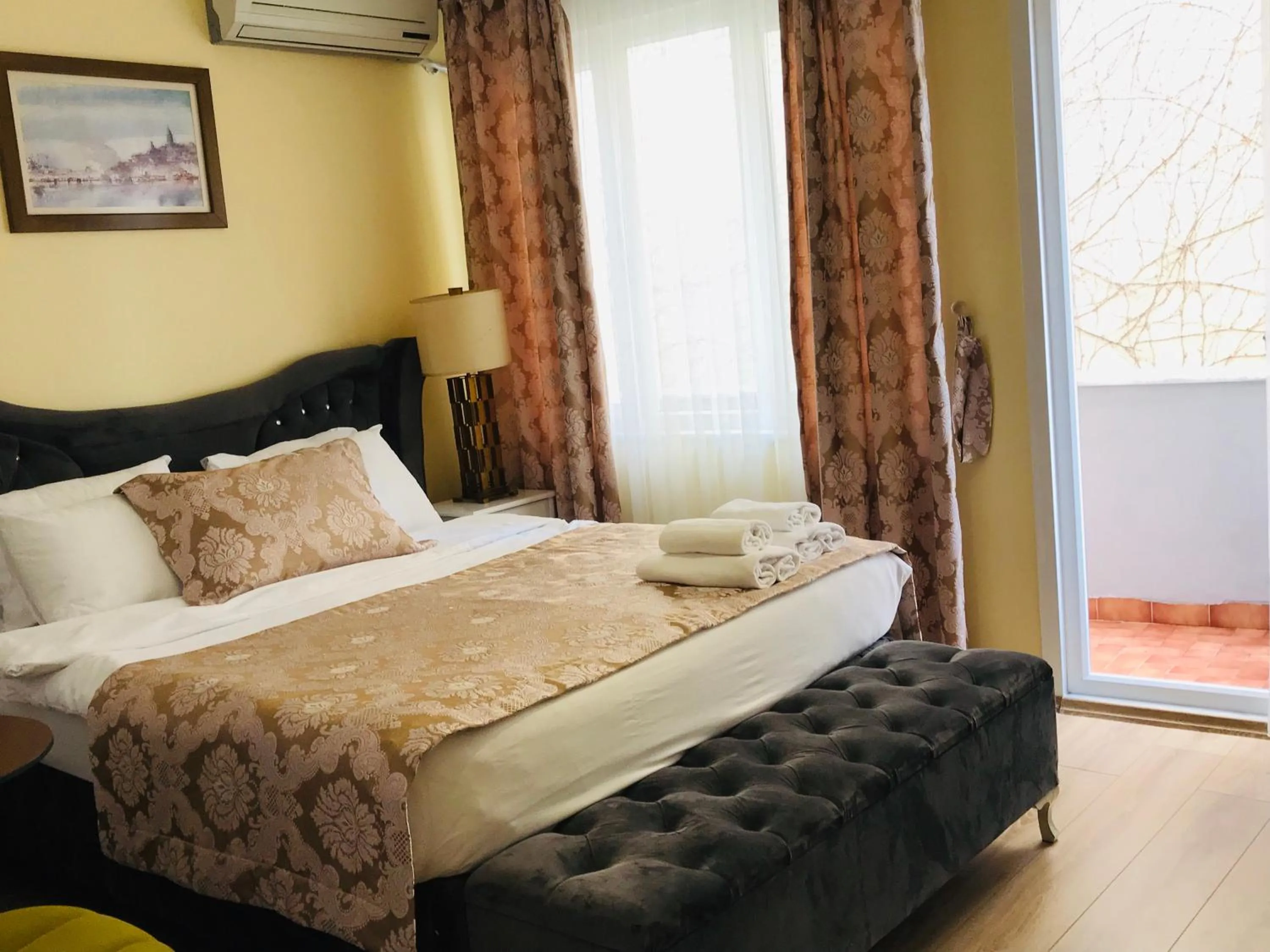 Bed in La Mer Boutique Hotel