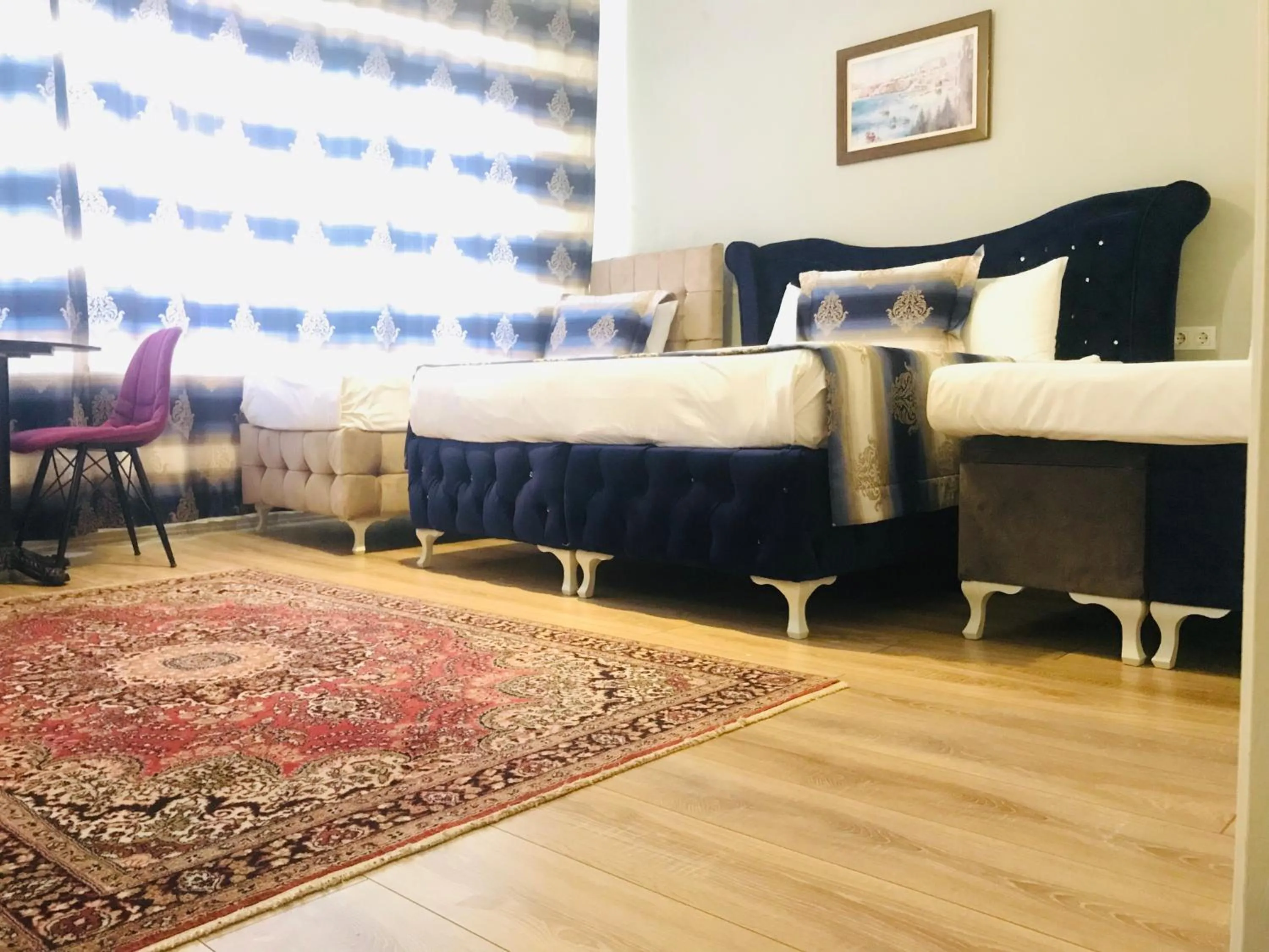 Bed in La Mer Boutique Hotel