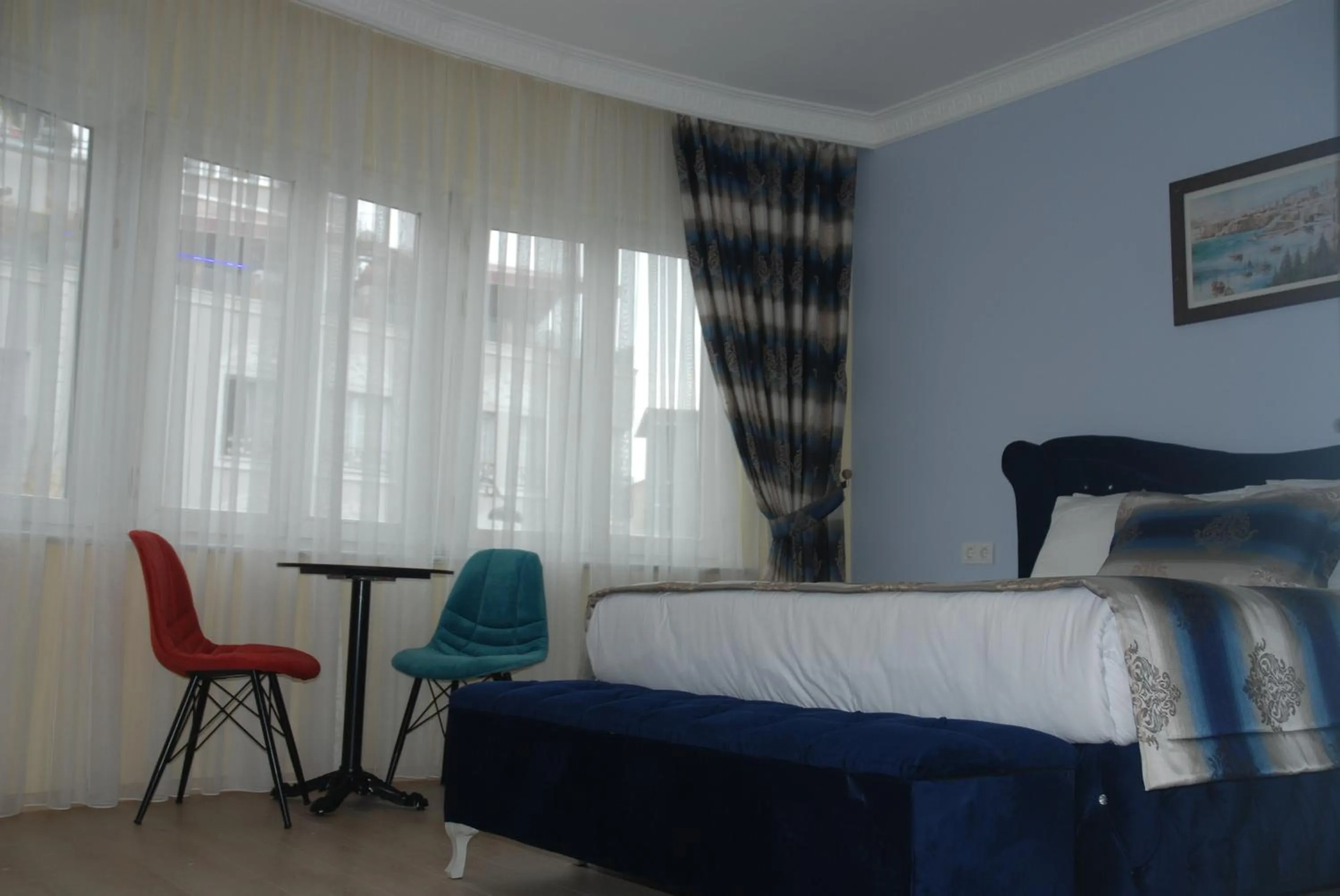 Bed in La Mer Boutique Hotel