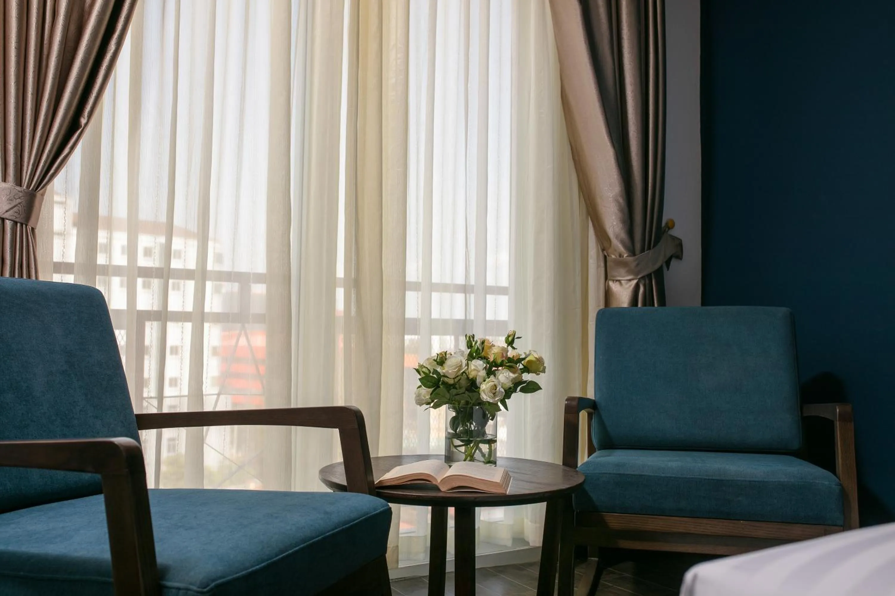 Living room in Azalea Parkview Hotel