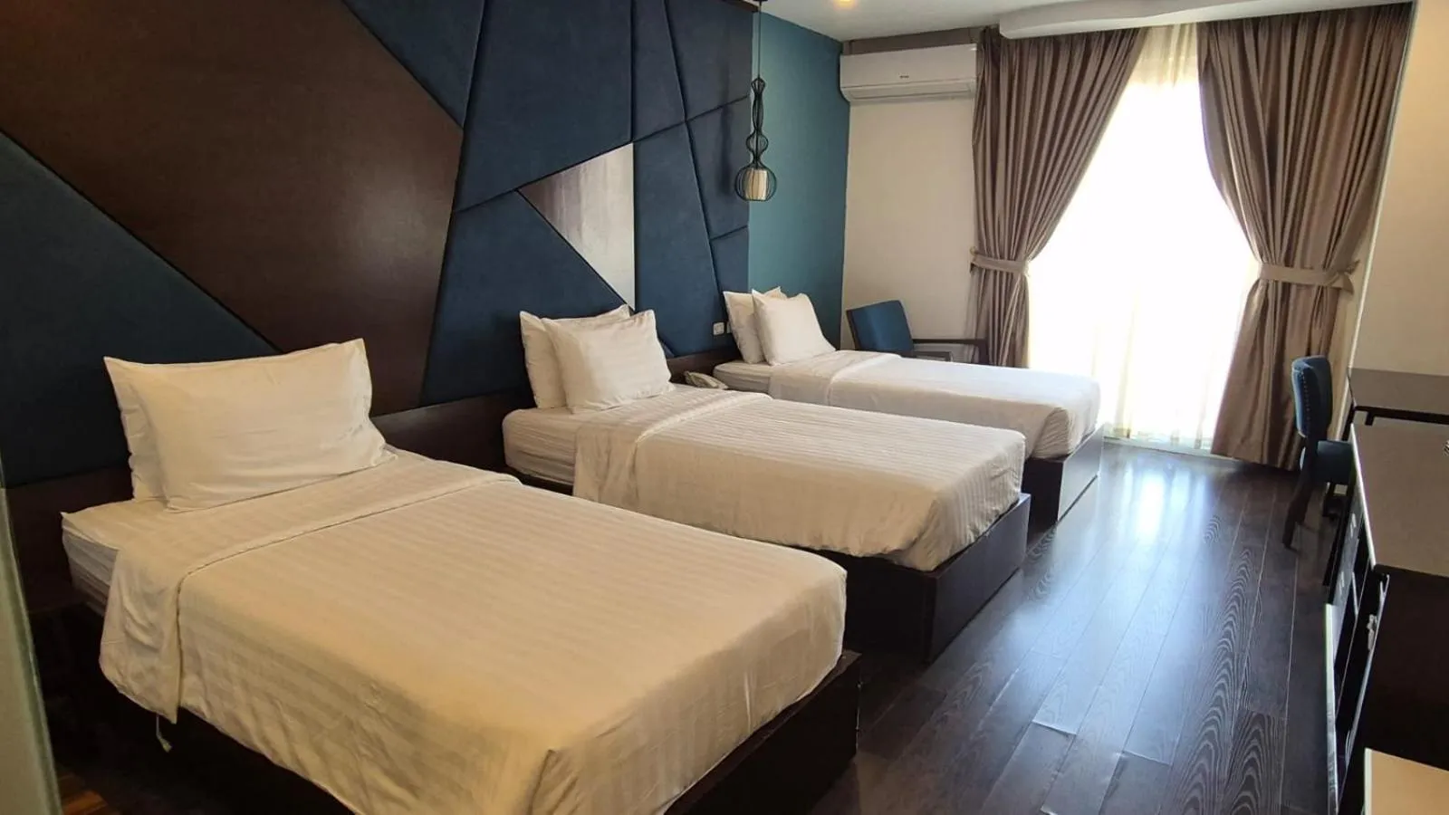 Bed in Azalea Parkview Hotel