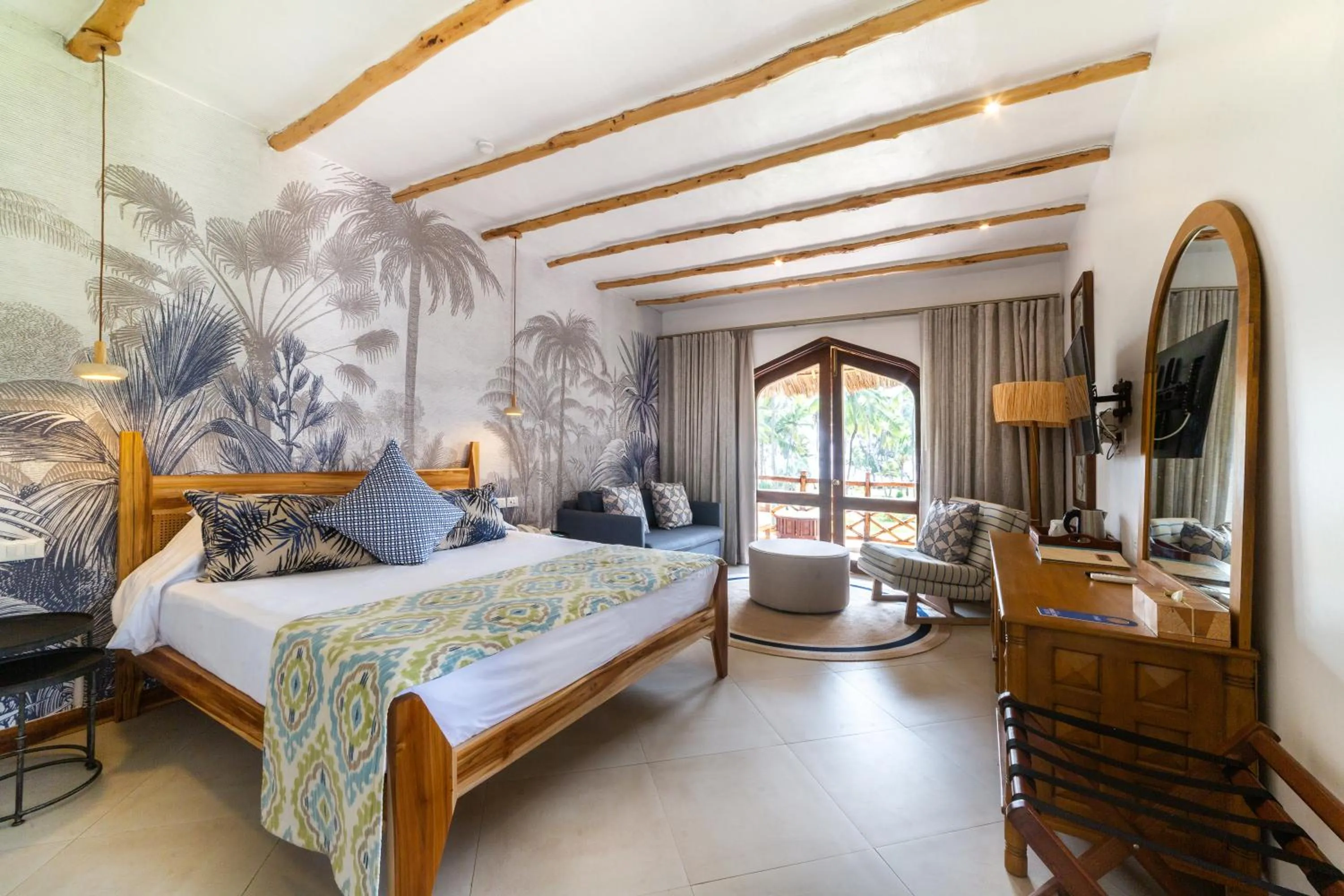 Bed in Bluebay Beach Resort & Spa