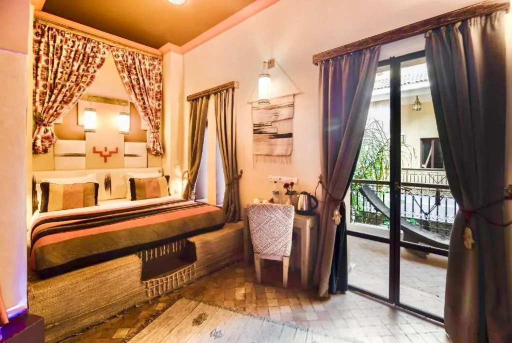 Bed in Riad Dar Alif & SPA