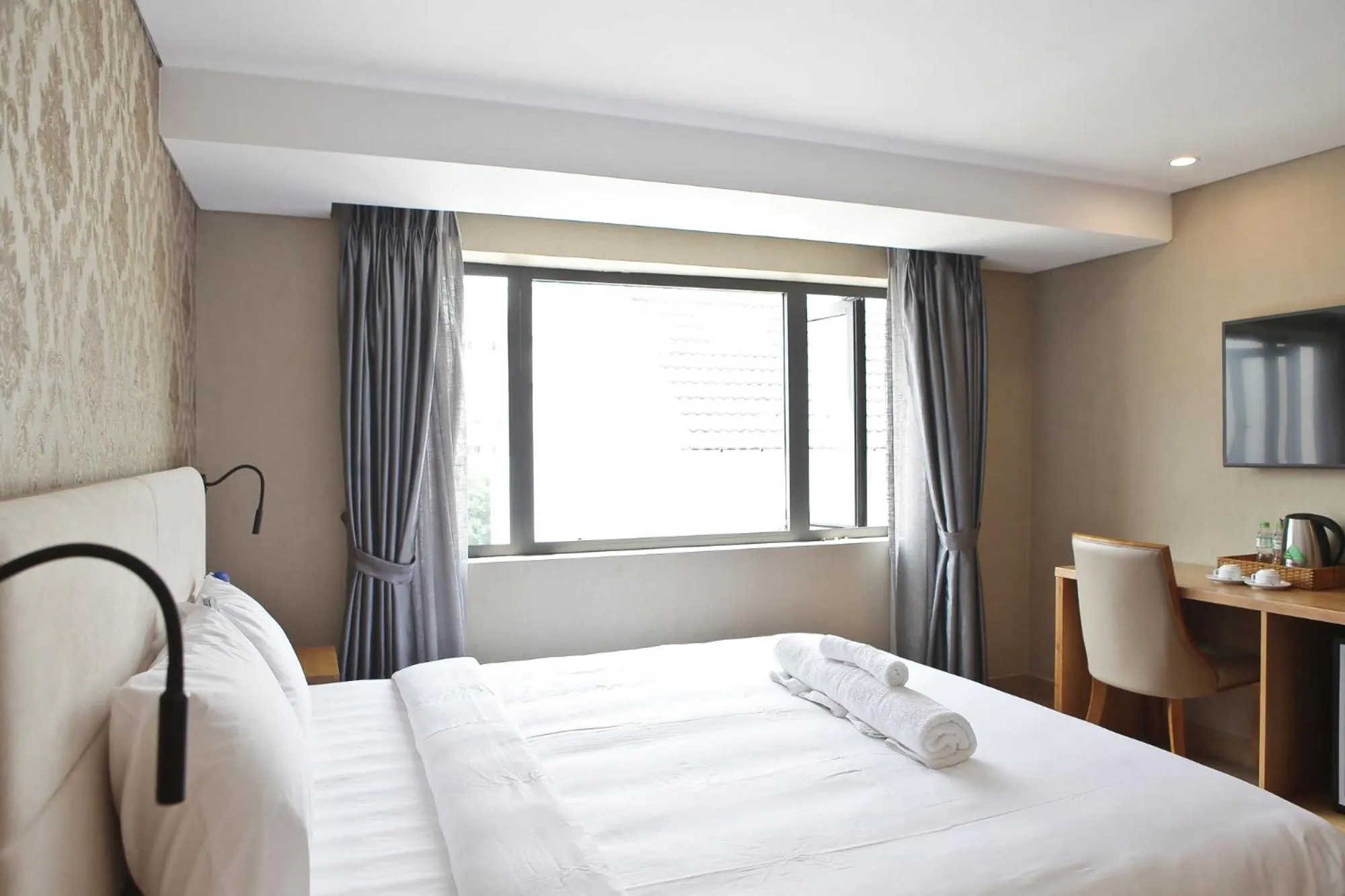 Bed in Imperial Saigon hotel