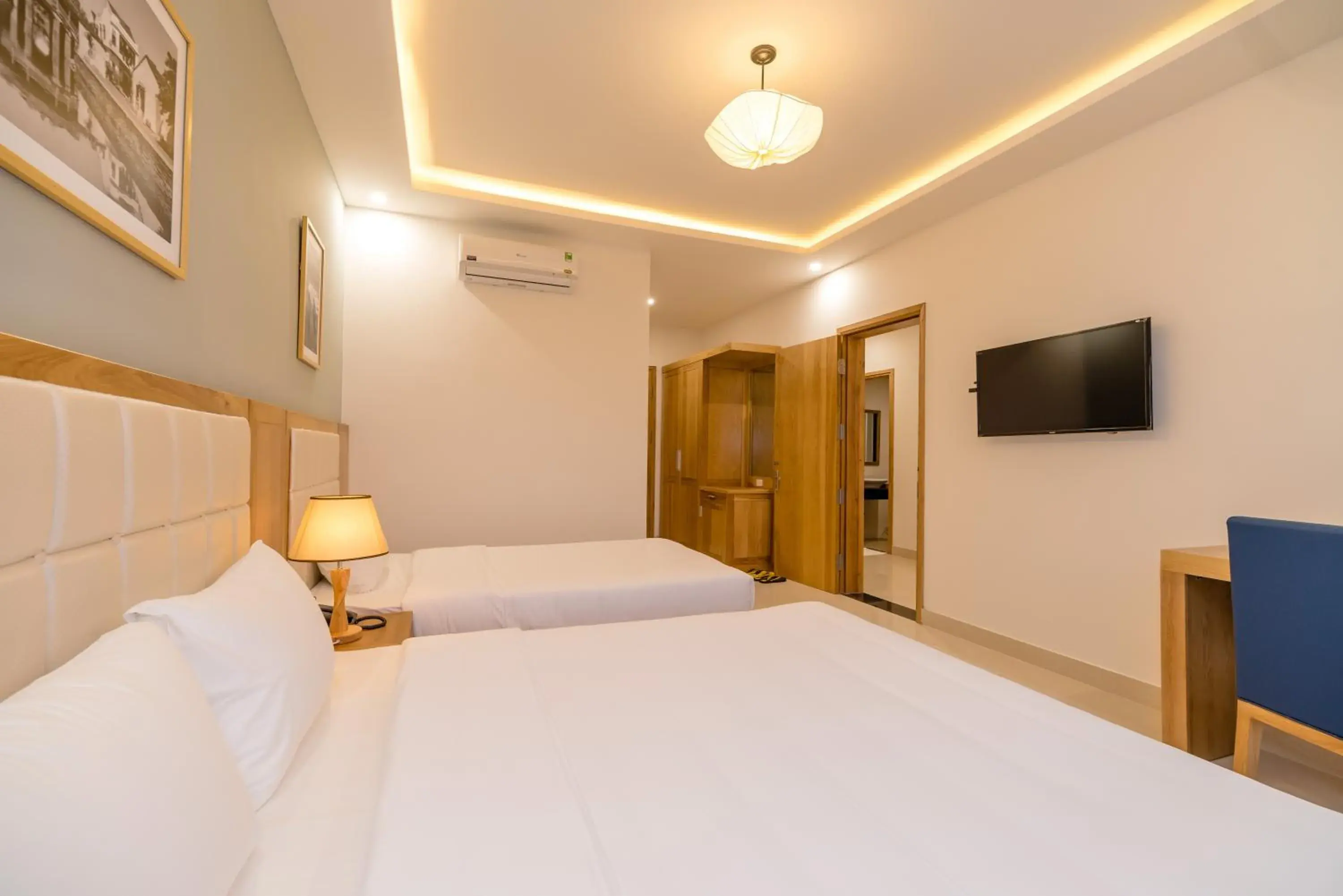 Triple Room with Balcony in Babylon Hoi An Central Villa Triple Room with Balcony in Babylon Hoi An Central Villa