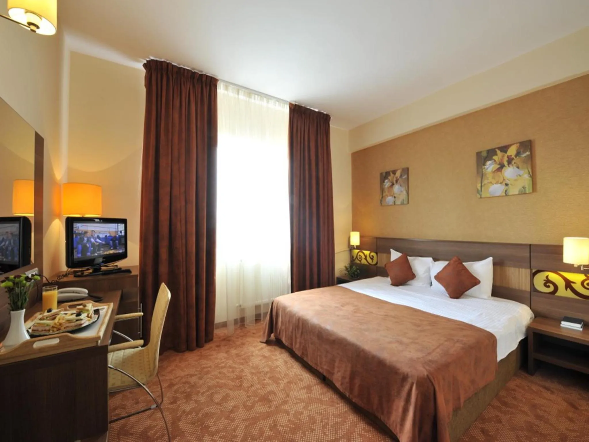 Bed in RIN Central Hotel