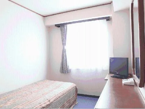 Photo of the whole room, Bed in Terminal Art Inn