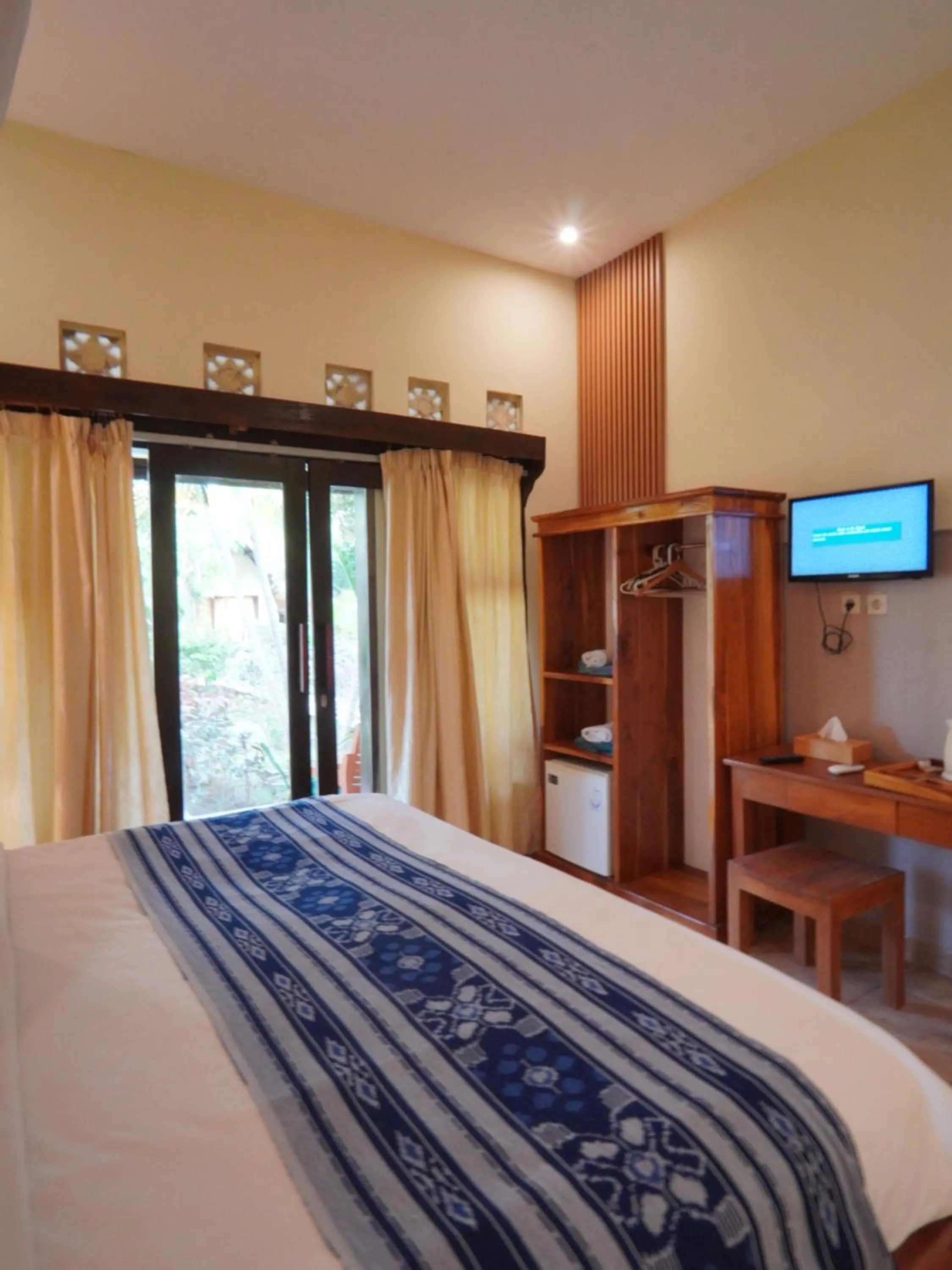 TV and multimedia, Bed in Salili Bungalow