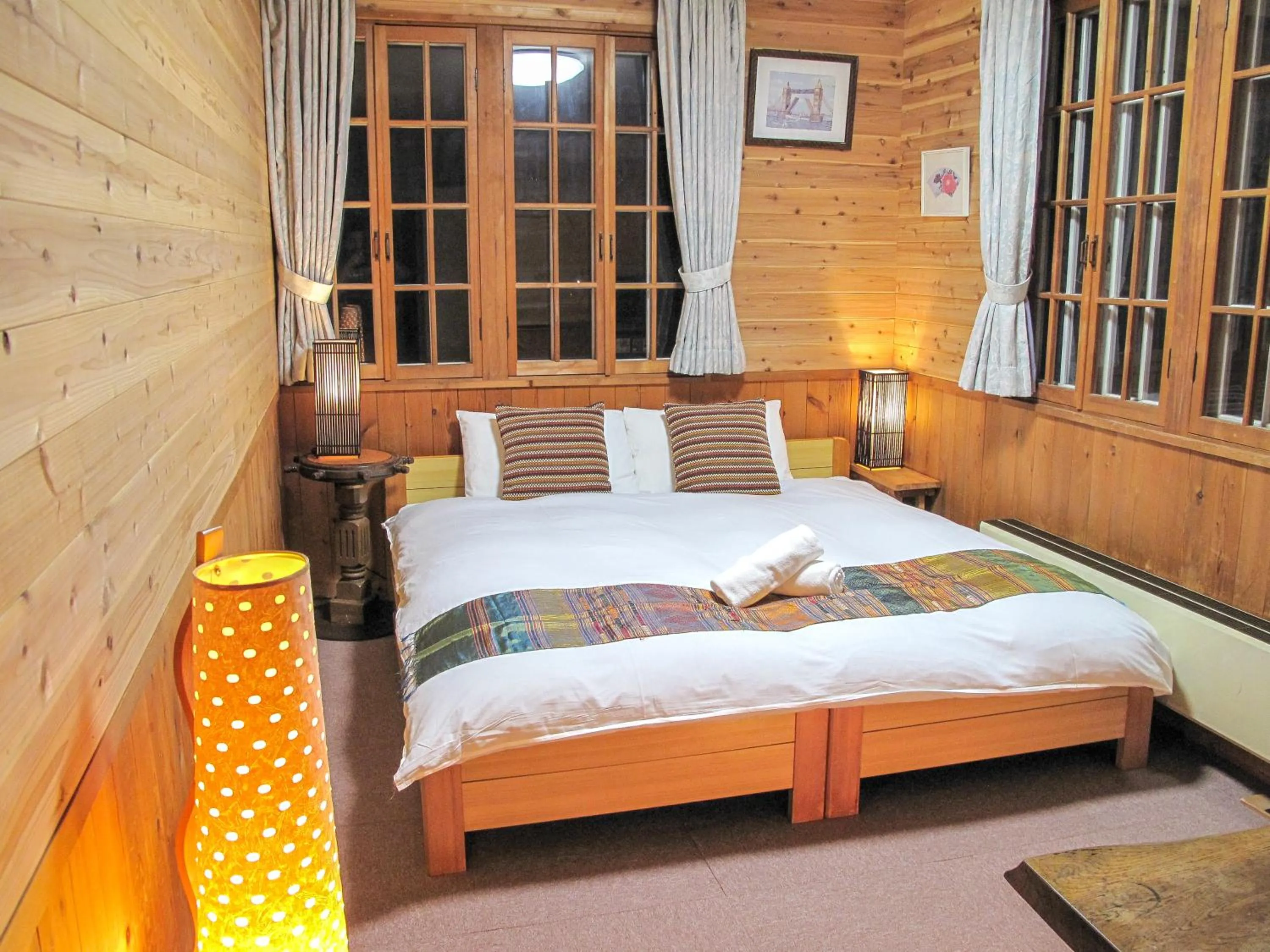 Bed in Kizuna Lodge & BBQ Centre