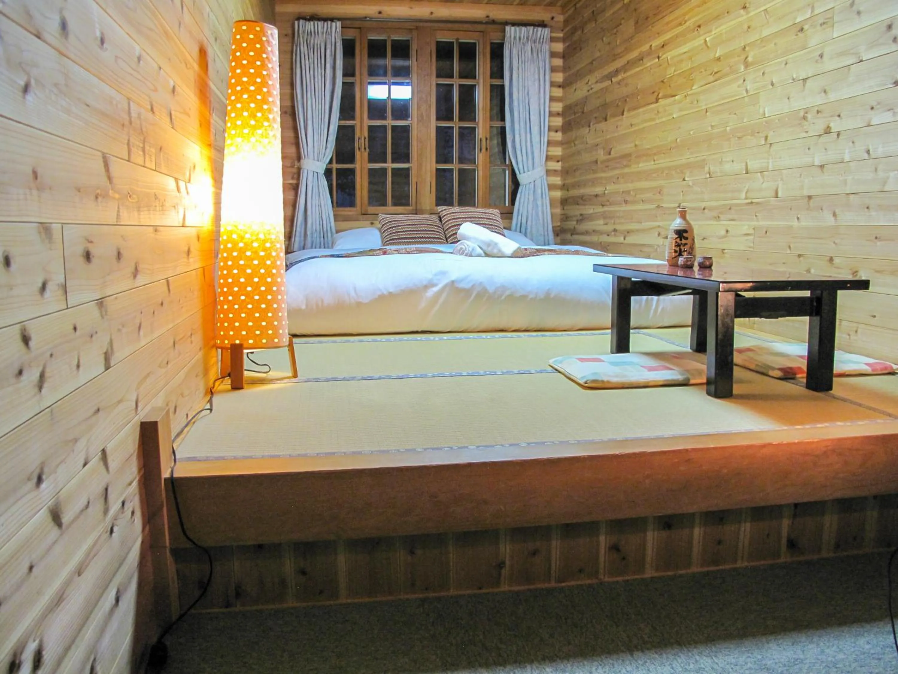 Bed in Kizuna Lodge & BBQ Centre