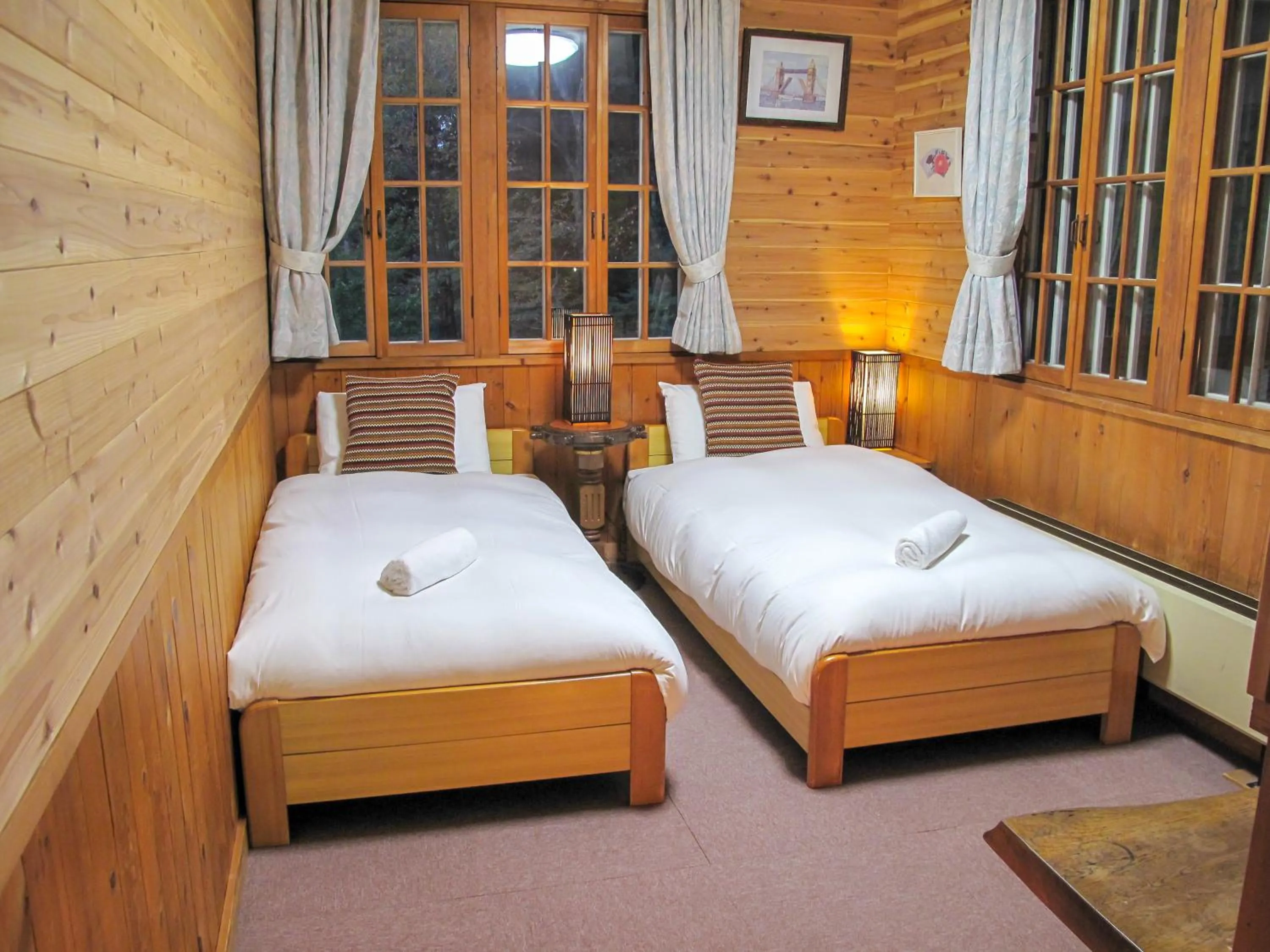 Bed in Kizuna Lodge & BBQ Centre