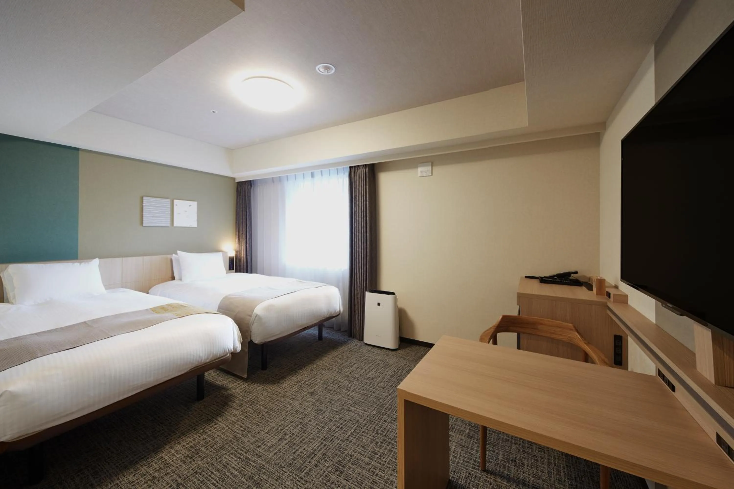 Photo of the whole room, Bed in Iroha Grand Hotel Matsumoto Eki-Mae