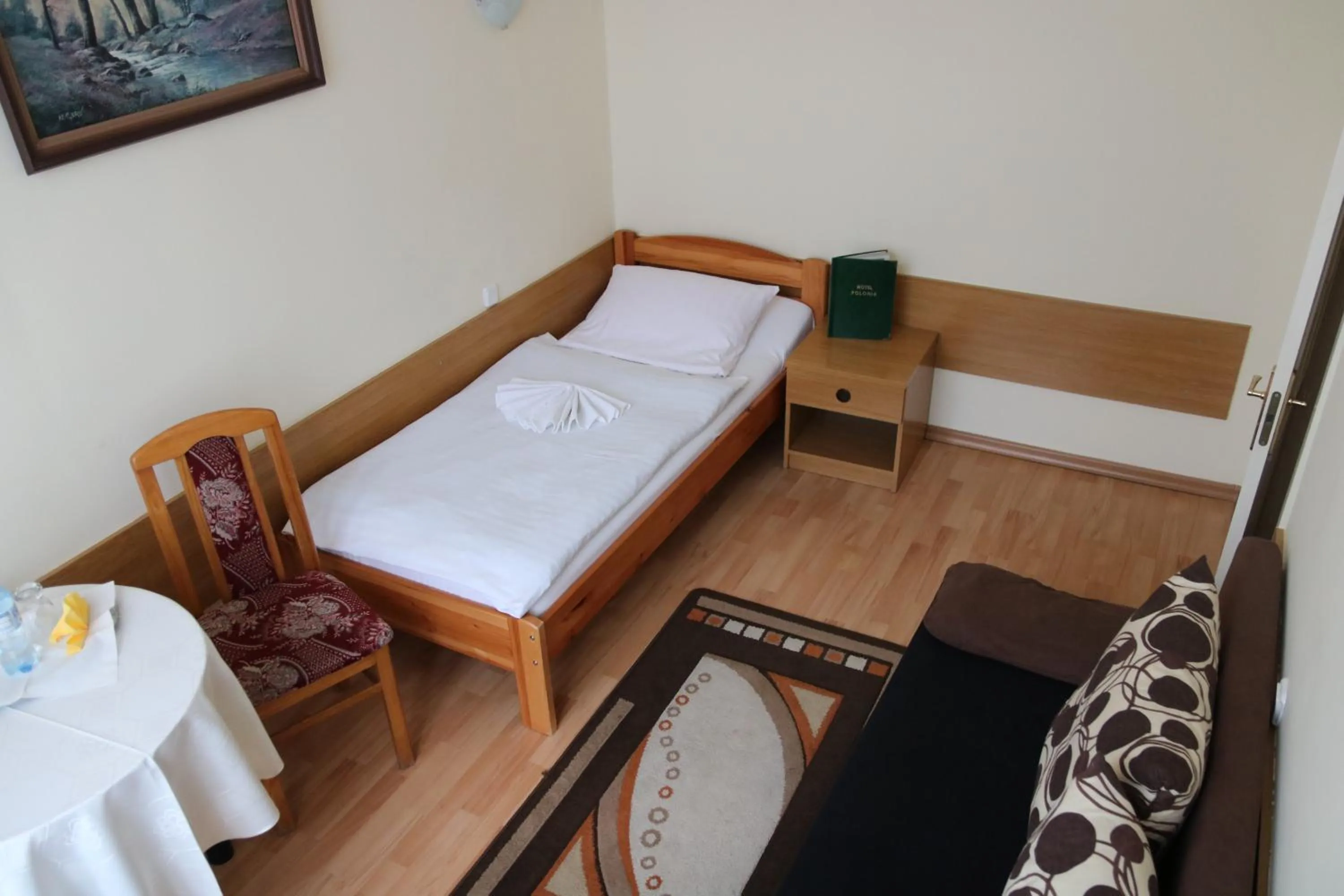 Bed in Hotel Polonia