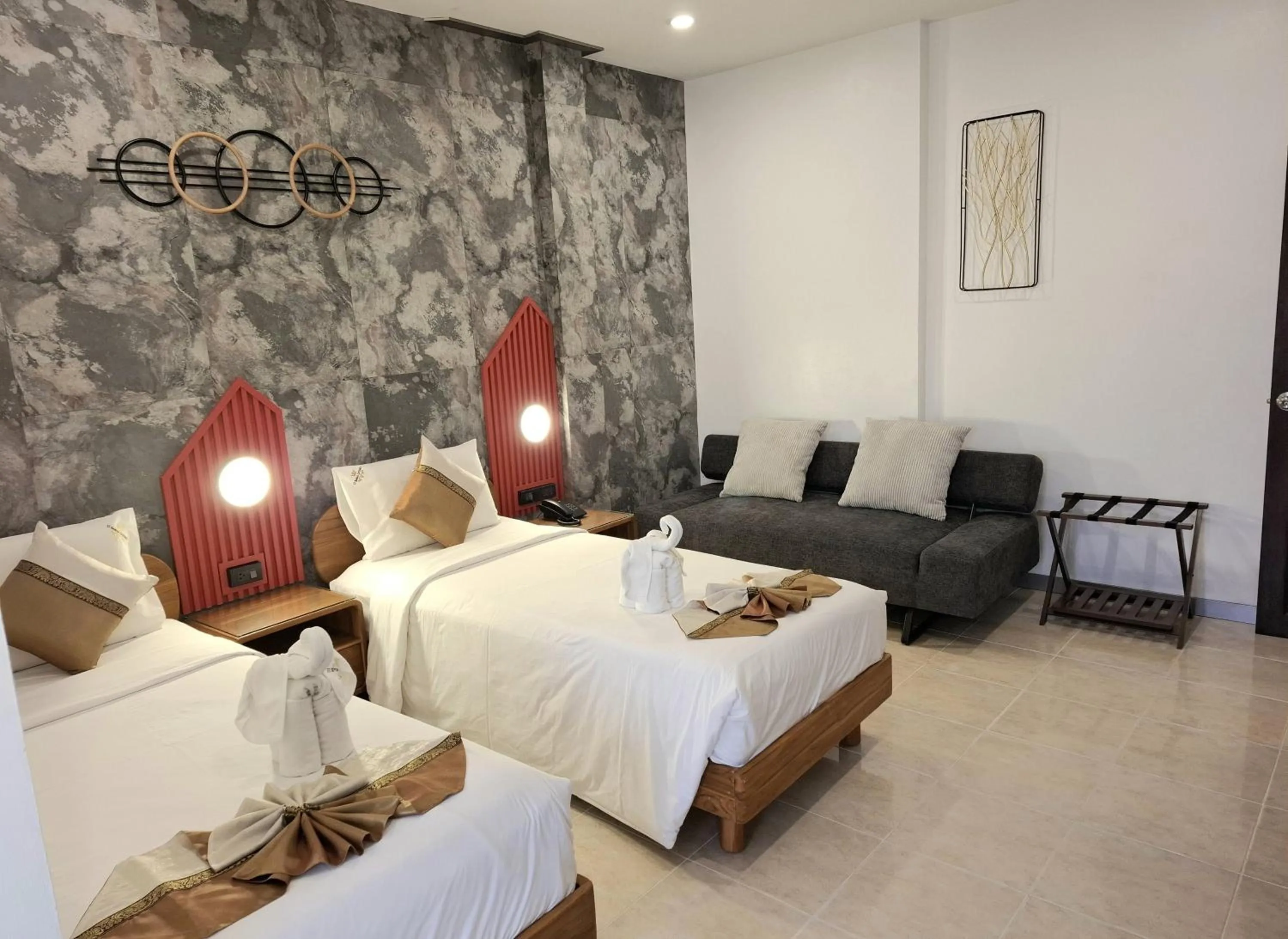 Bed in U Sabai Living Hotel