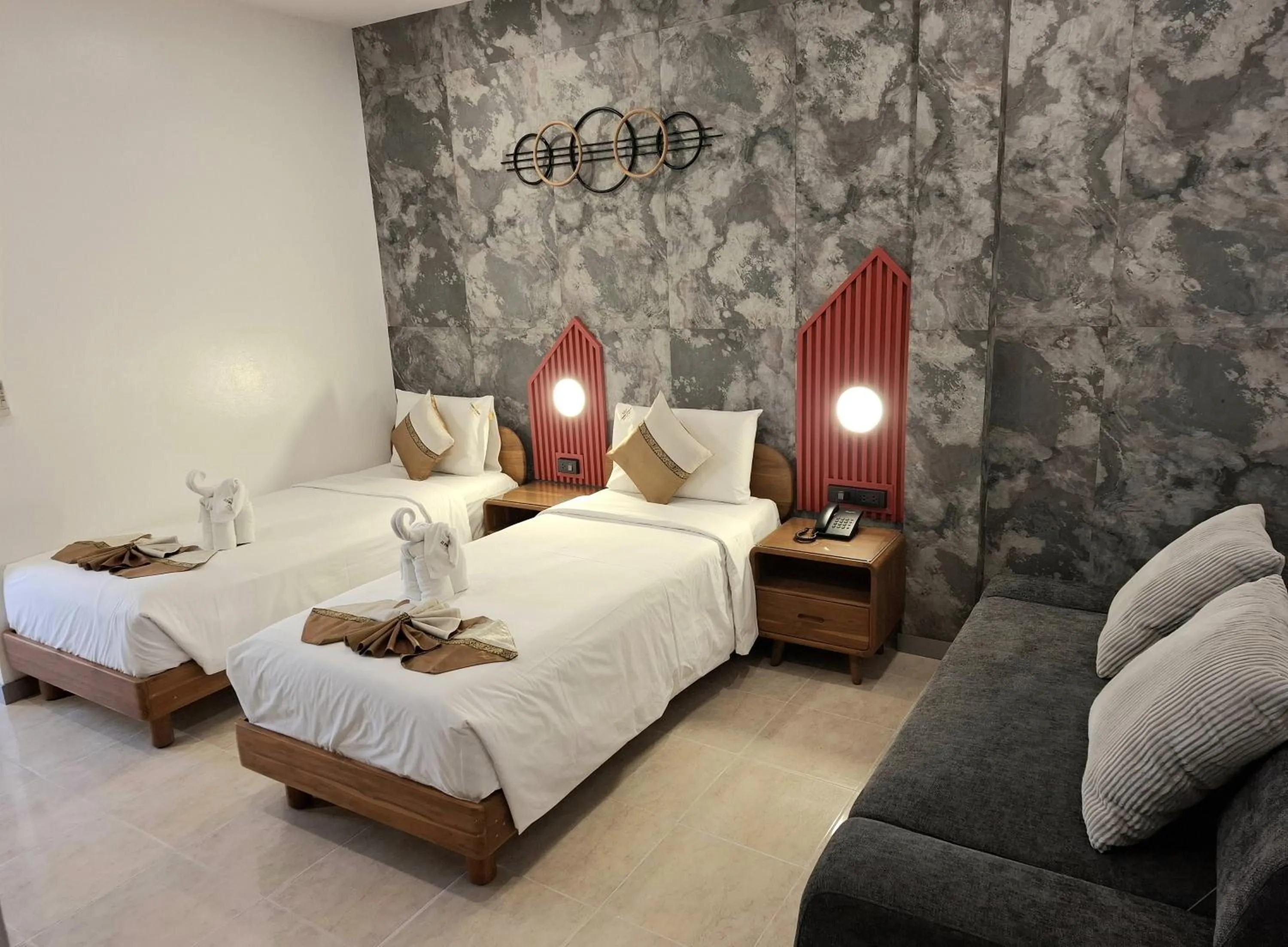 Bed in U Sabai Living Hotel