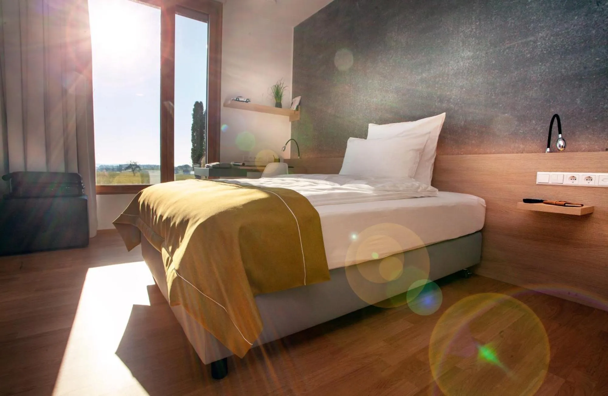 Garden view, Bed in DEKRA Congresshotel Wart