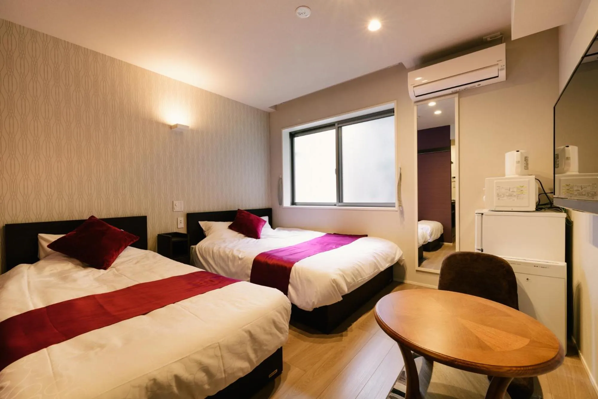 Photo of the whole room, Bed in GRAND BASE Hakata Haruyoshi
