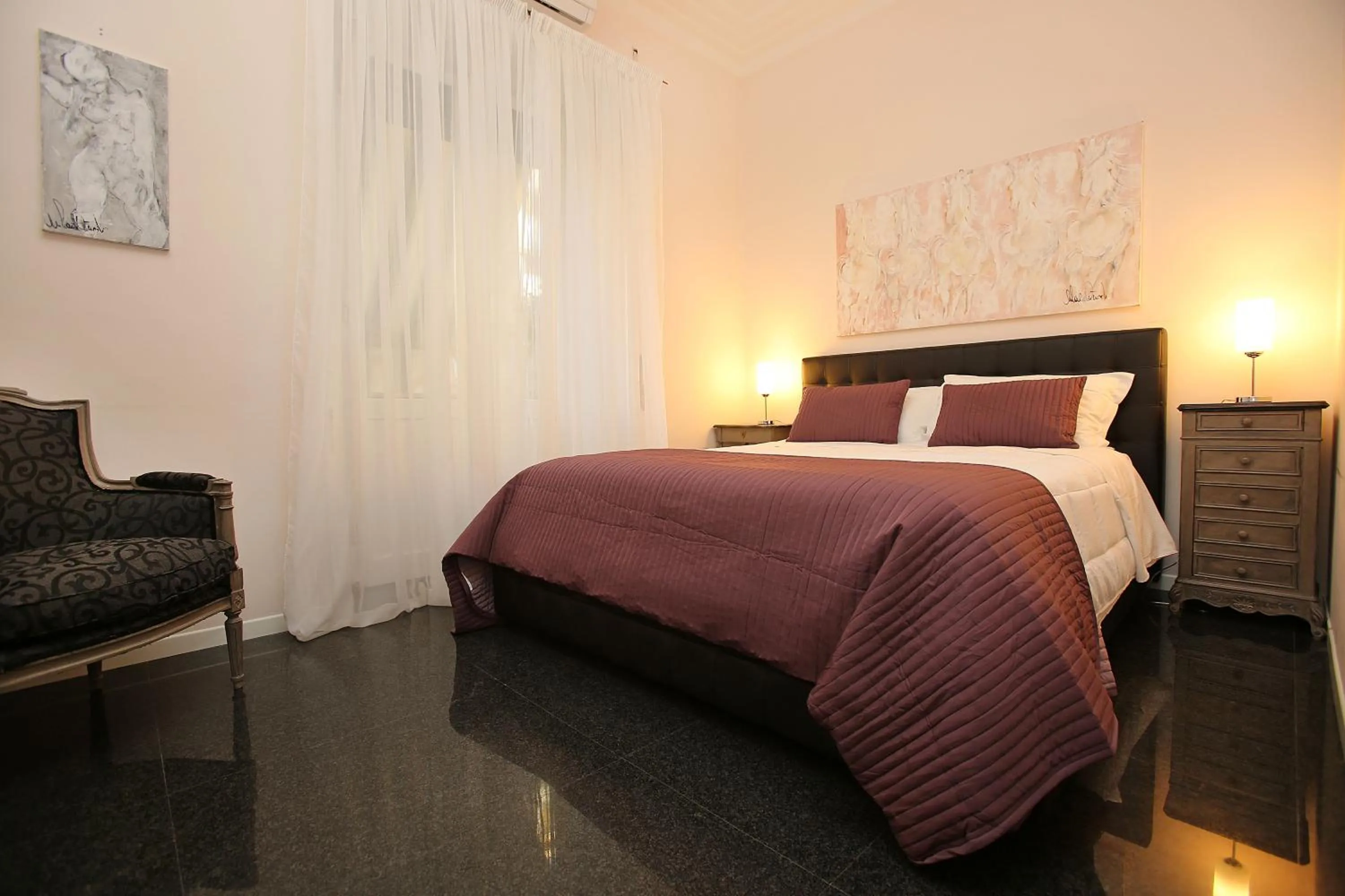 Bed in Amica Roma Guest House