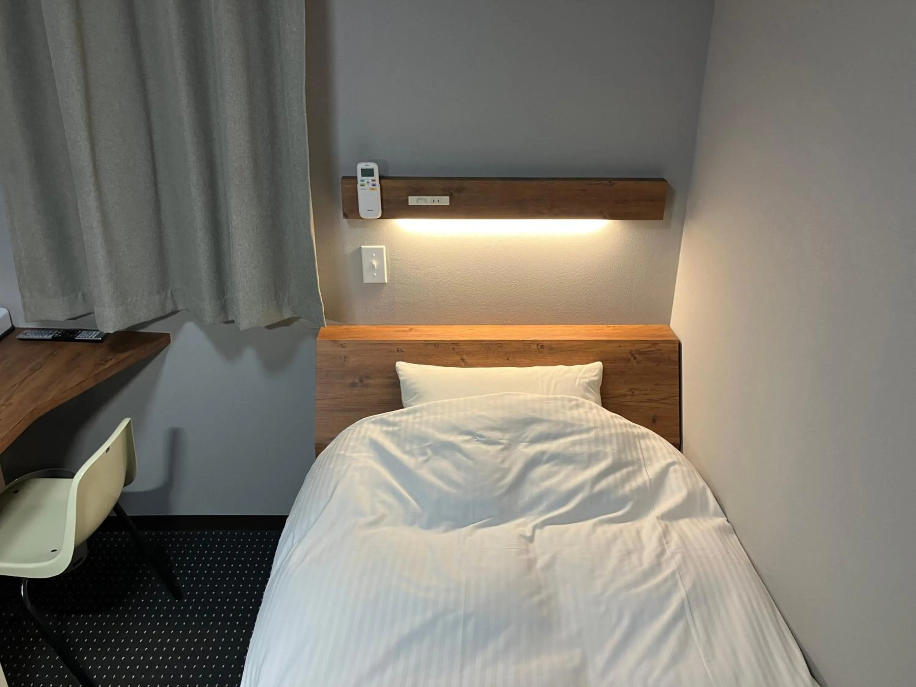 Bed in Atto Business Hotel Ichinoseki