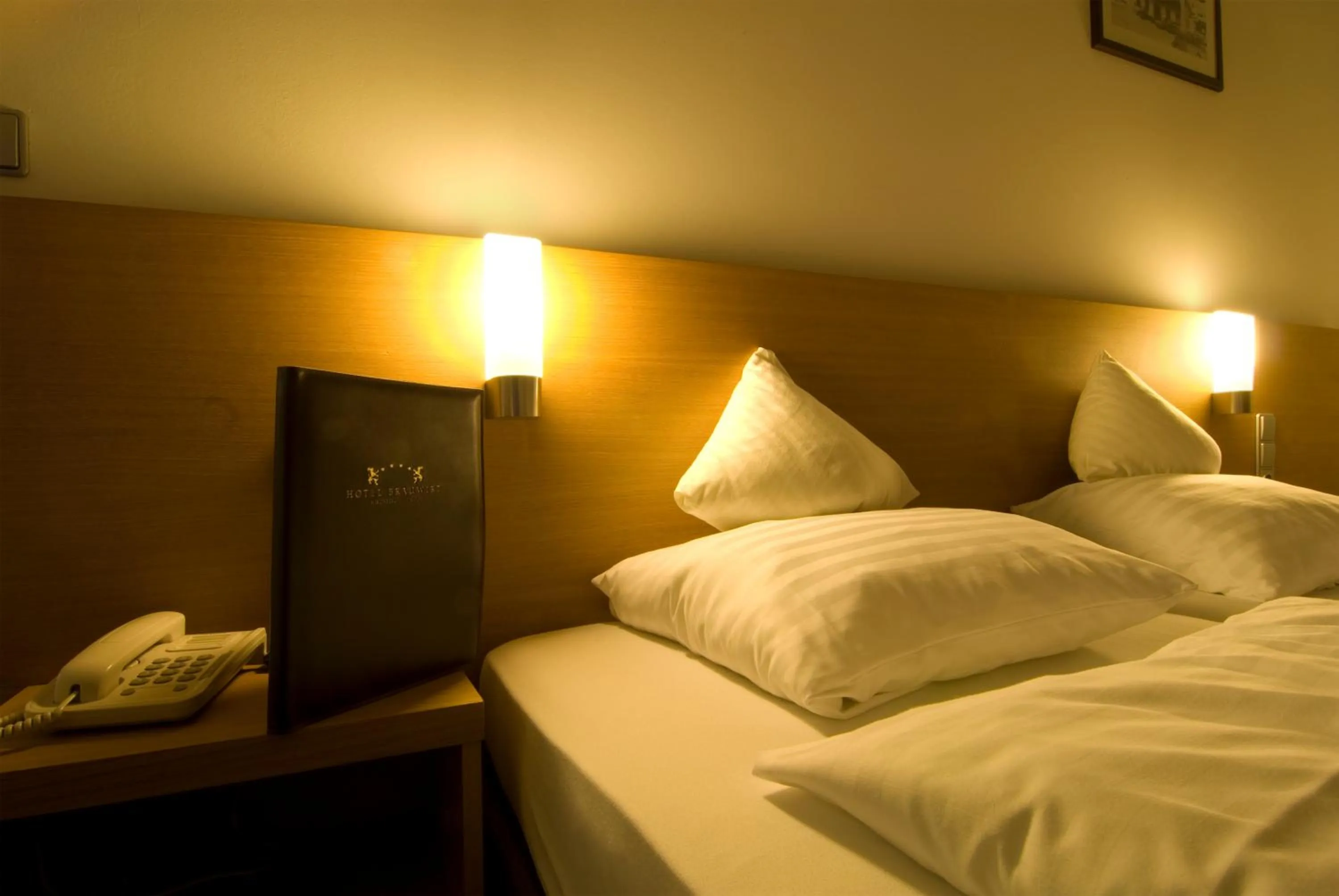 Bed in Hotel Bräuwirt