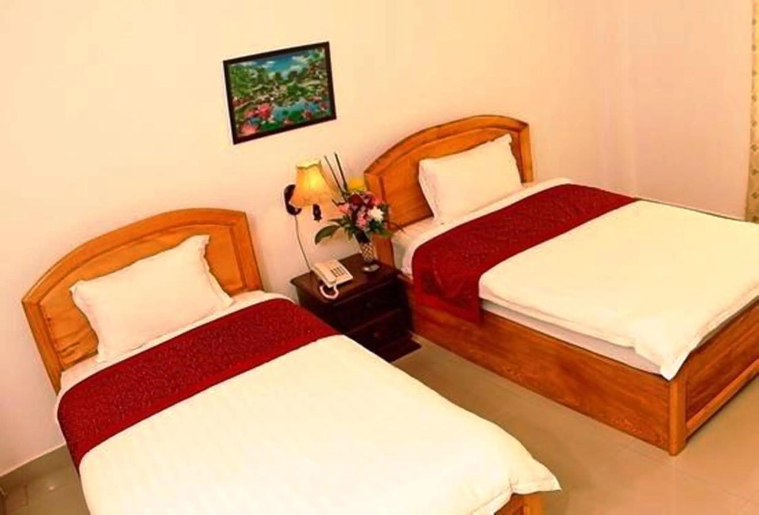 Bed in Douangpraseuth Hotel
