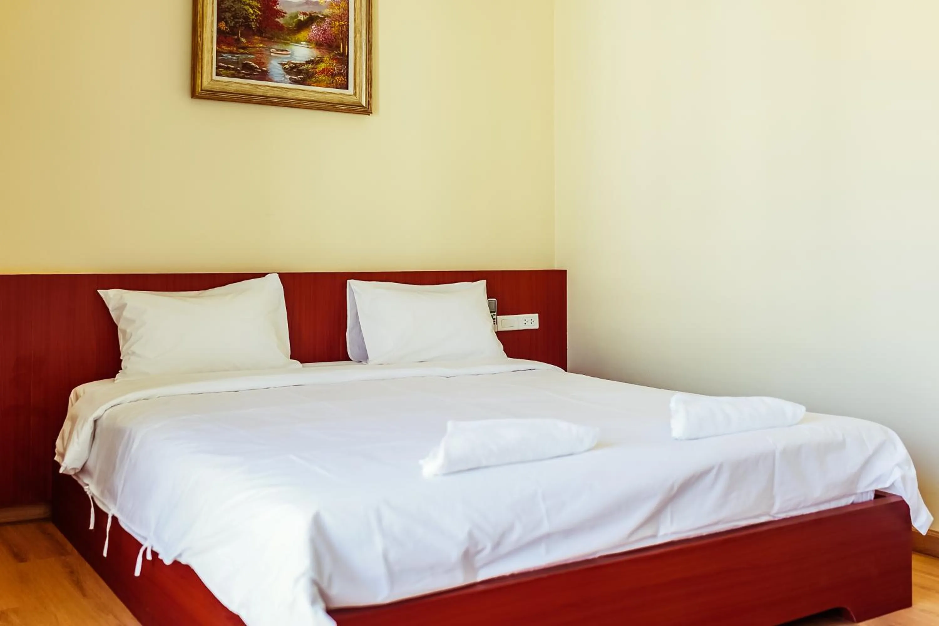 Bed in Douangpraseuth Hotel