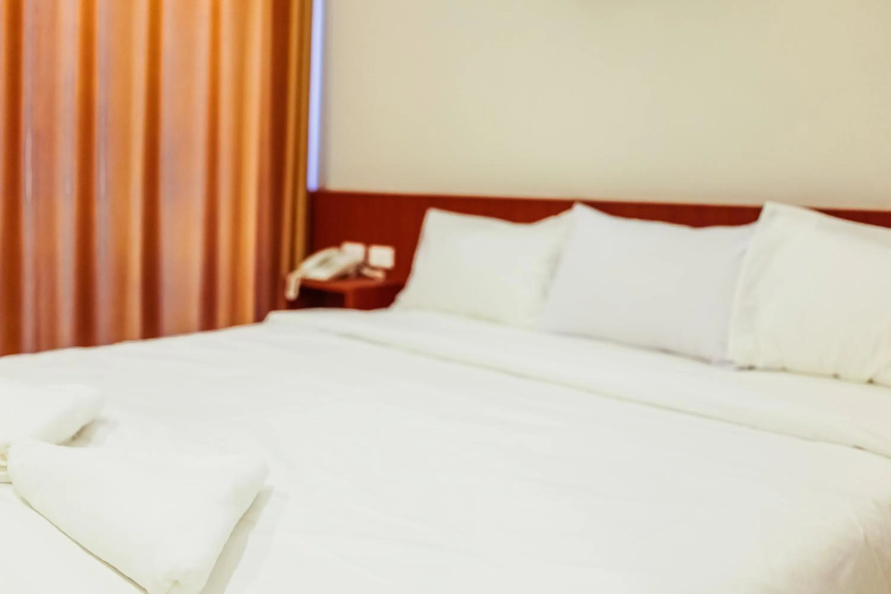 Bed in Douangpraseuth Hotel