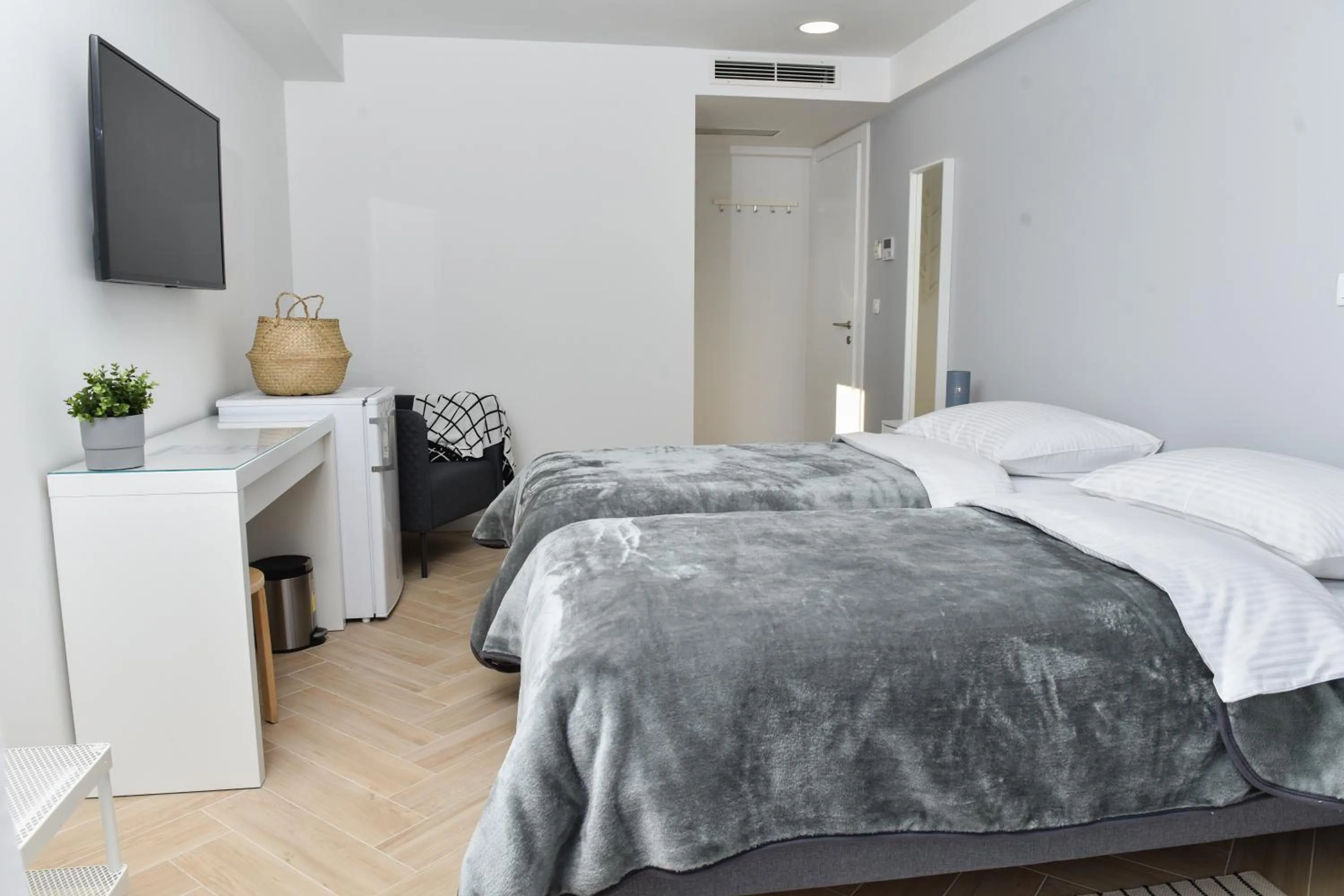 Bed in Rooms at Zajčeva 34