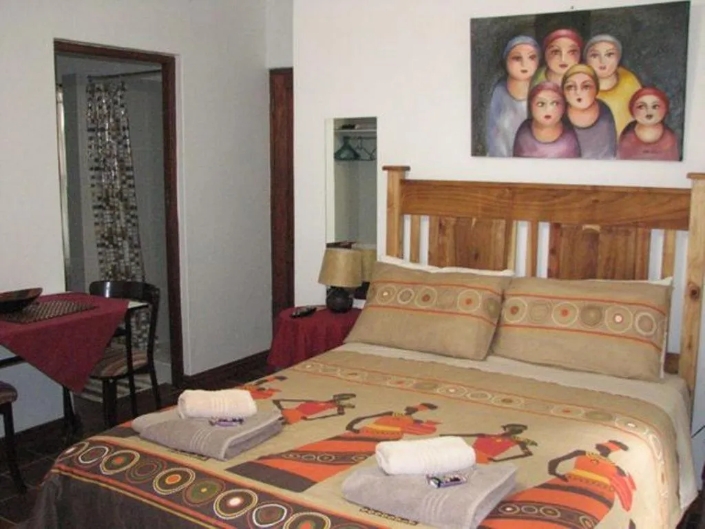 Bed in Magnolia Place Guest Houses