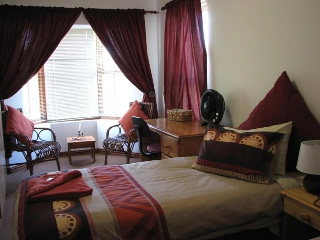 Bed in Magnolia Place Guest Houses