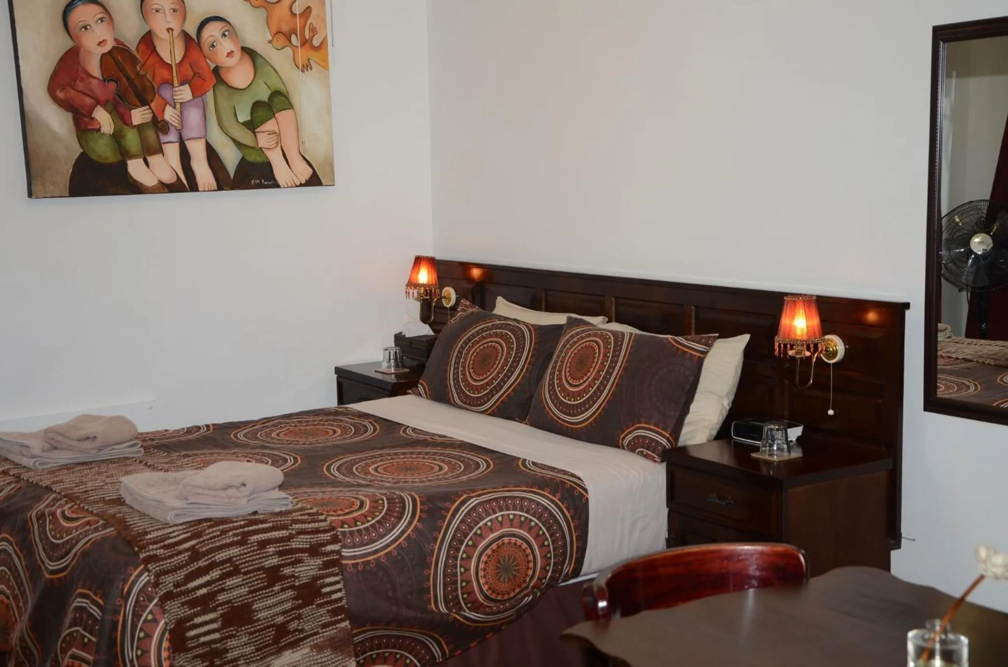 Bed in Magnolia Place Guest Houses