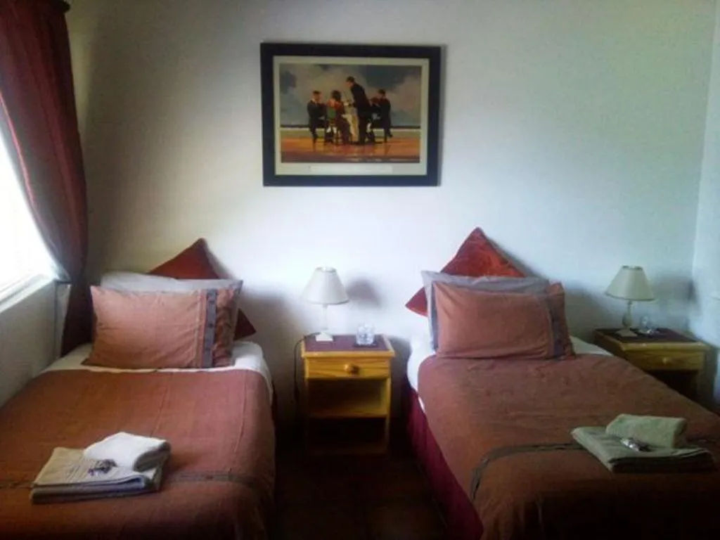 Bed in Magnolia Place Guest Houses