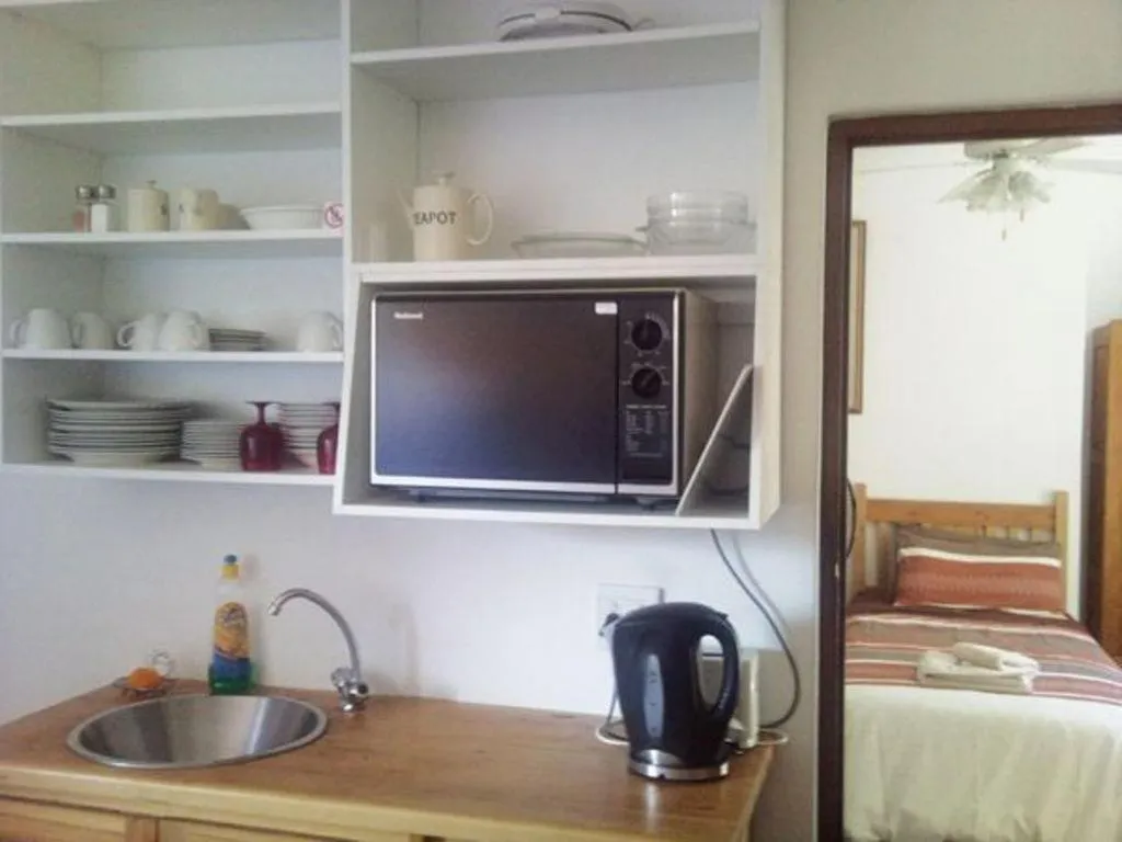 Kitchen or kitchenette in Magnolia Place Guest Houses