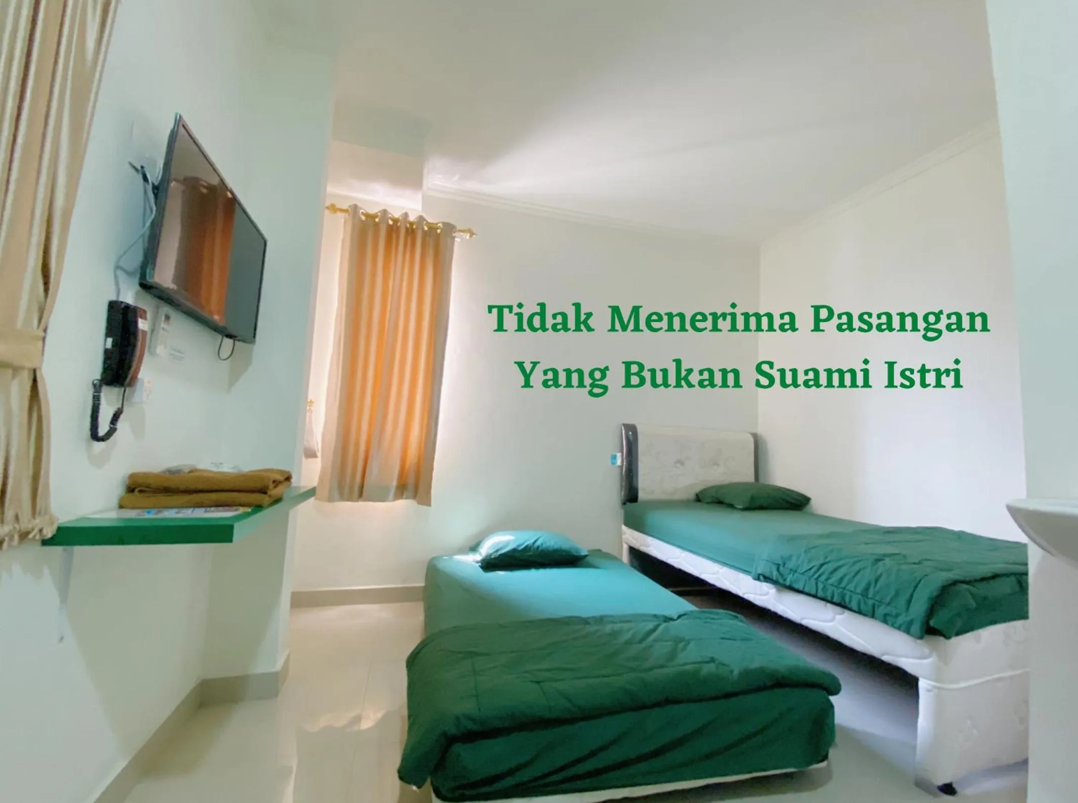 Bed in Anugrah Inn