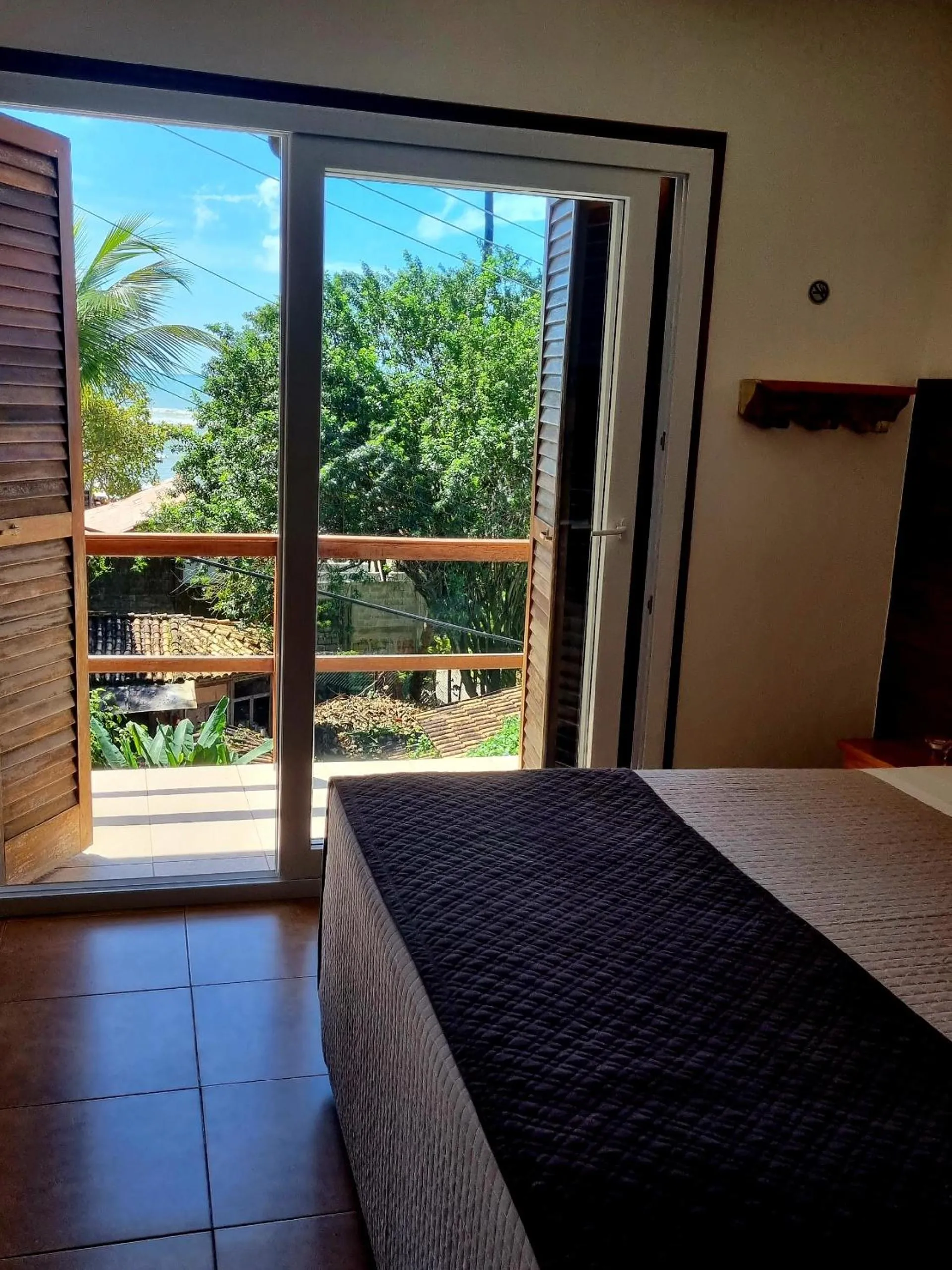 View (from property/room), Bed in Pousada Bahia Bella