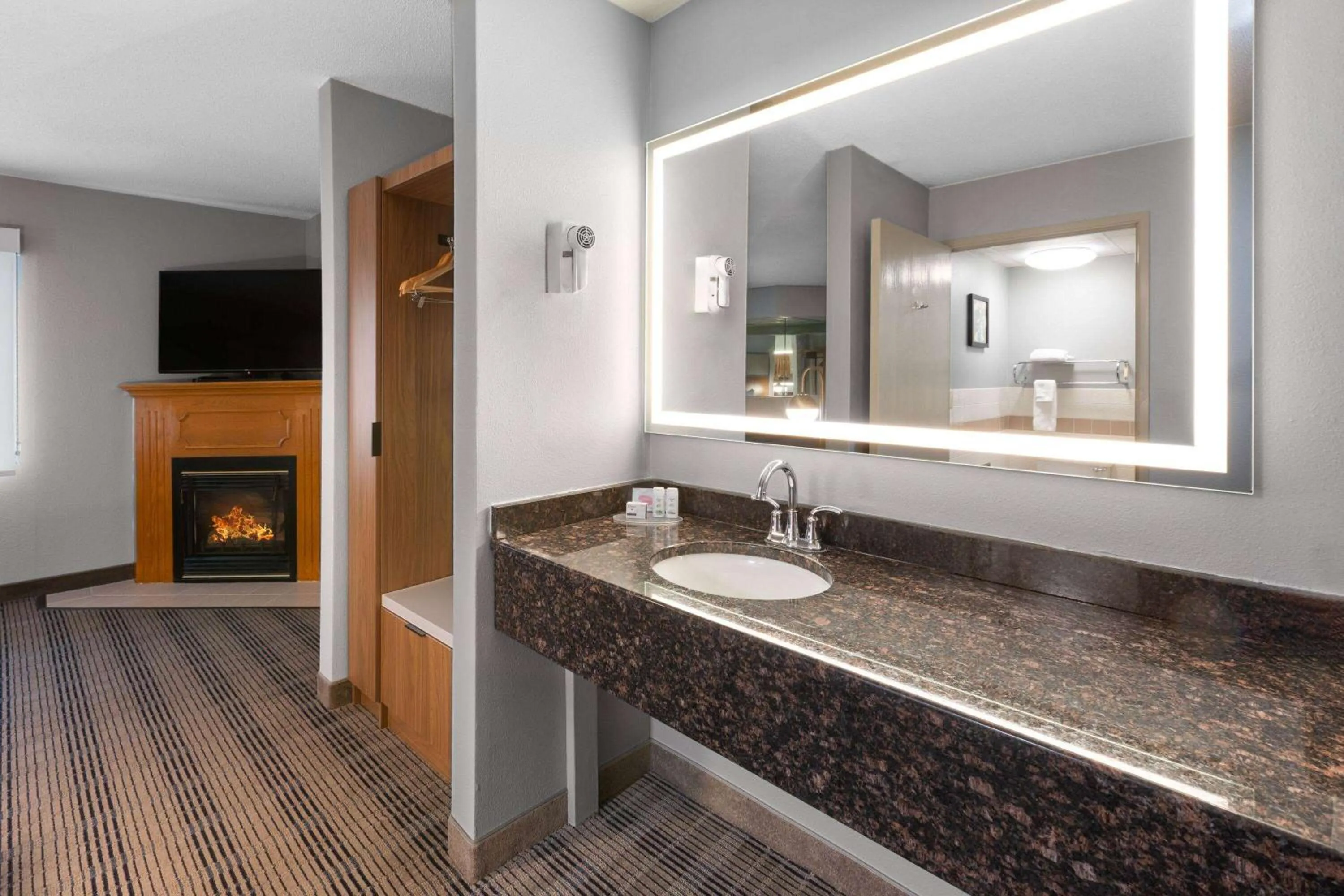 Bathroom in AmericInn by Wyndham North Branch