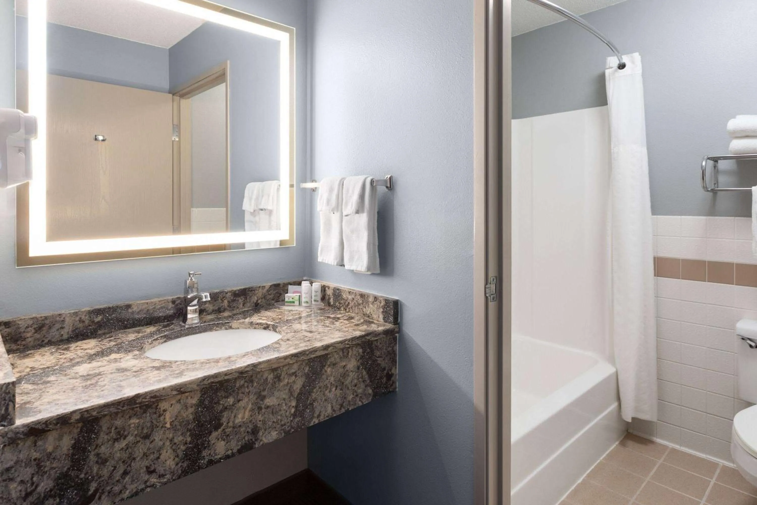 Bathroom in AmericInn by Wyndham North Branch