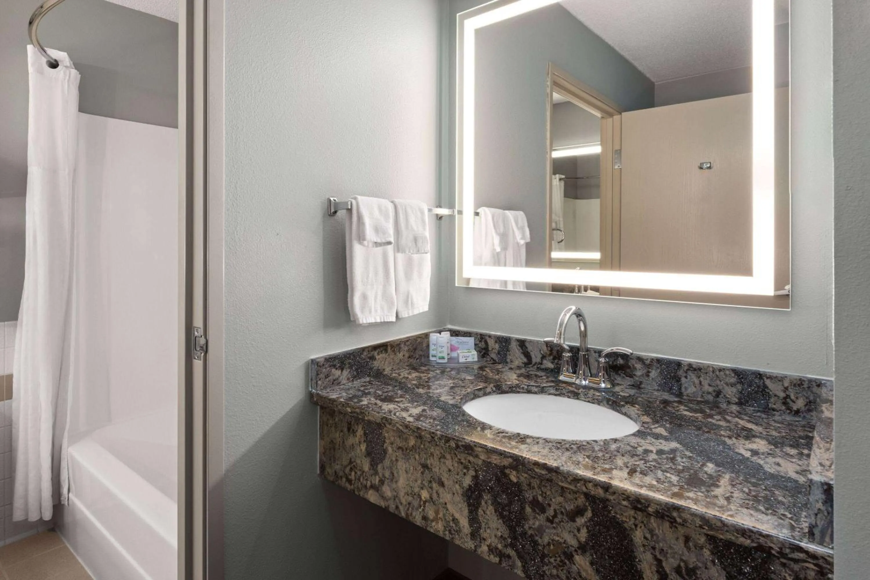 Bathroom in AmericInn by Wyndham North Branch