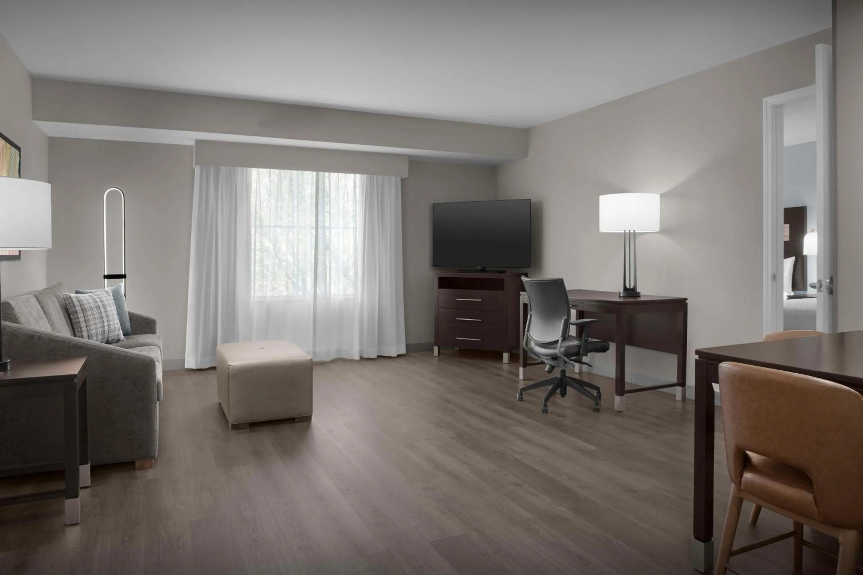 Living room in Homewood Suites by Hilton Orlando Airport