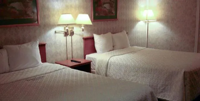 Bed in Blue Bird Hotel