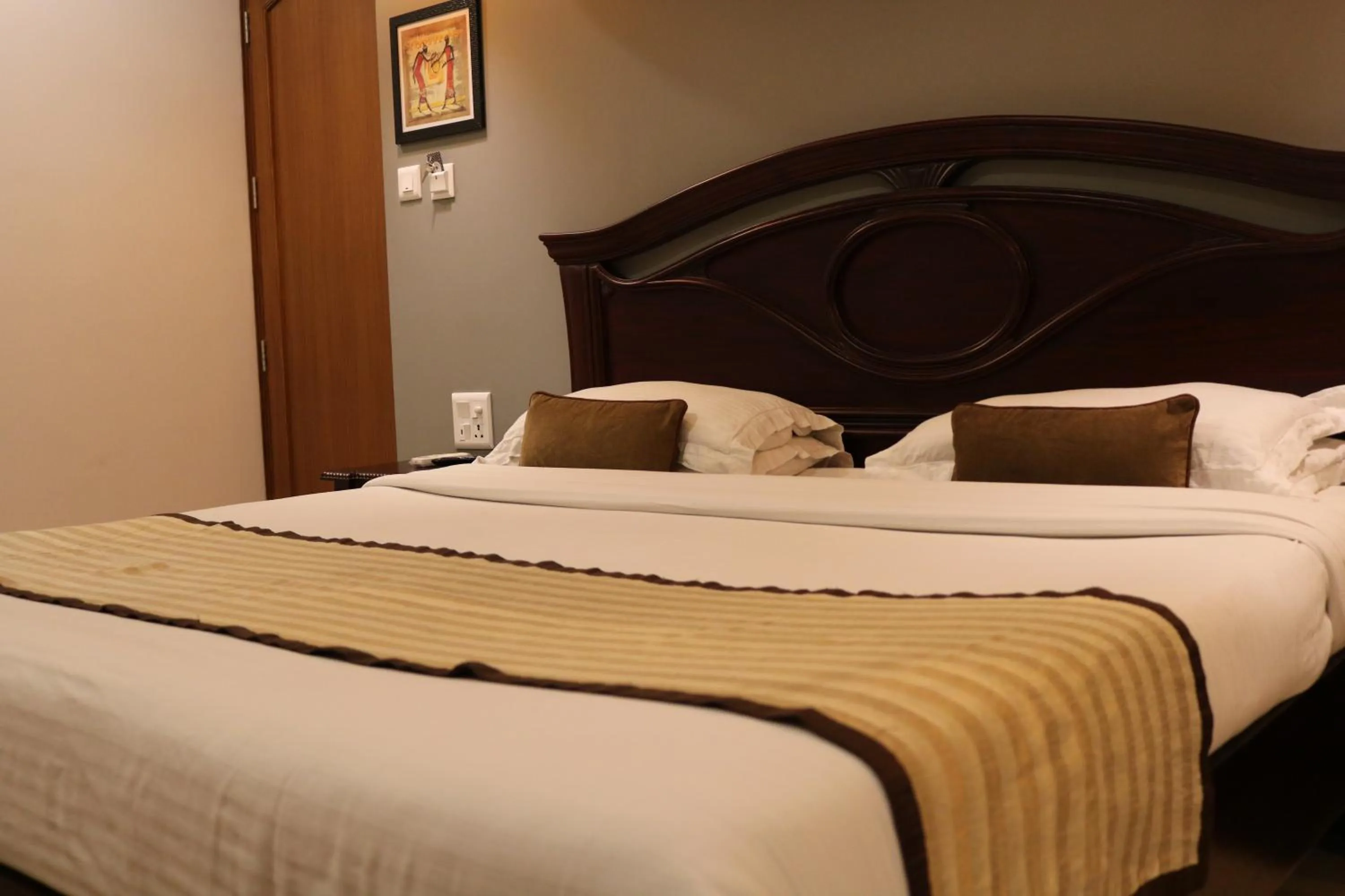 Bed in Hotel Park Residency