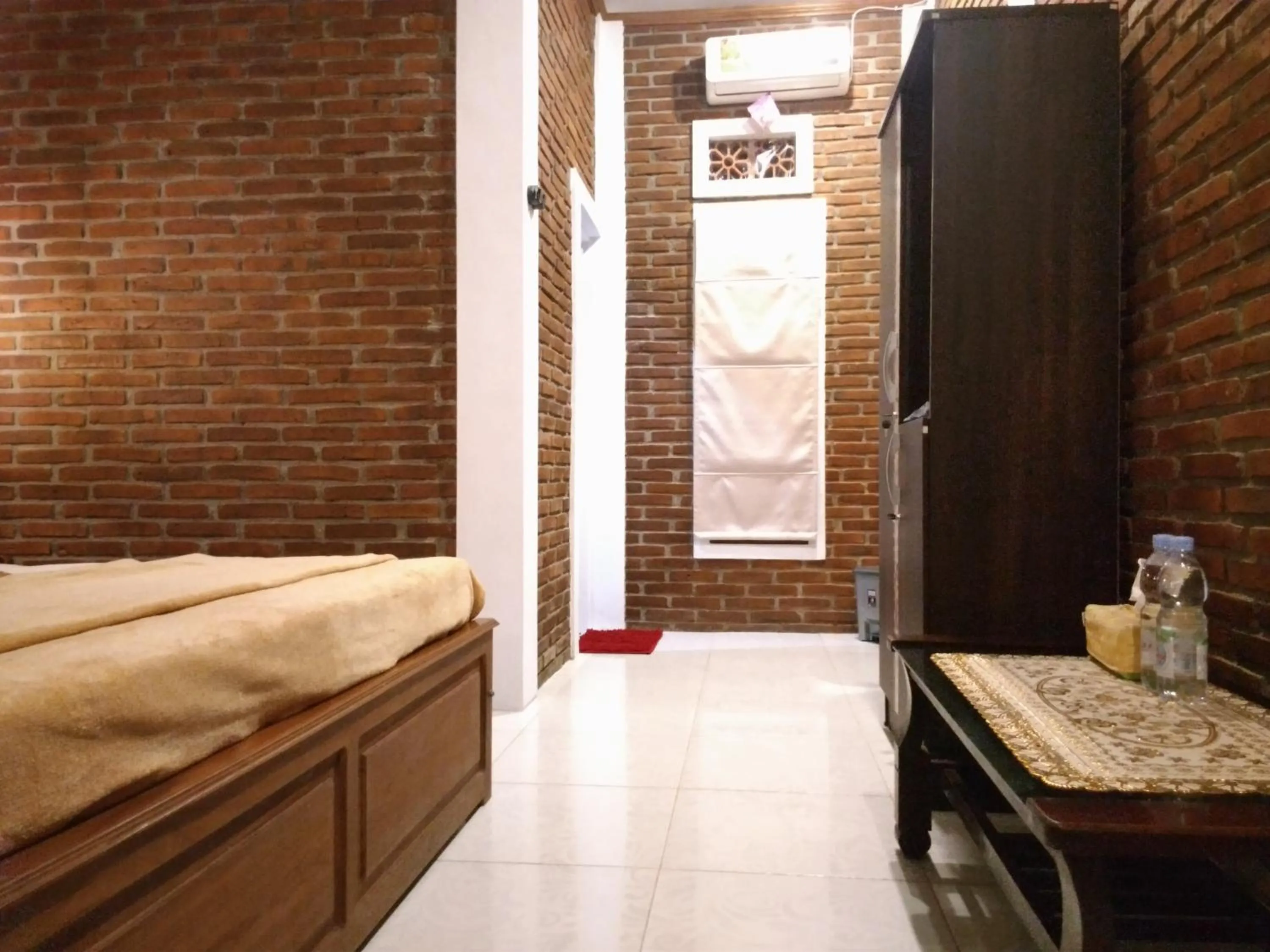 Bed in Genthong Homestay