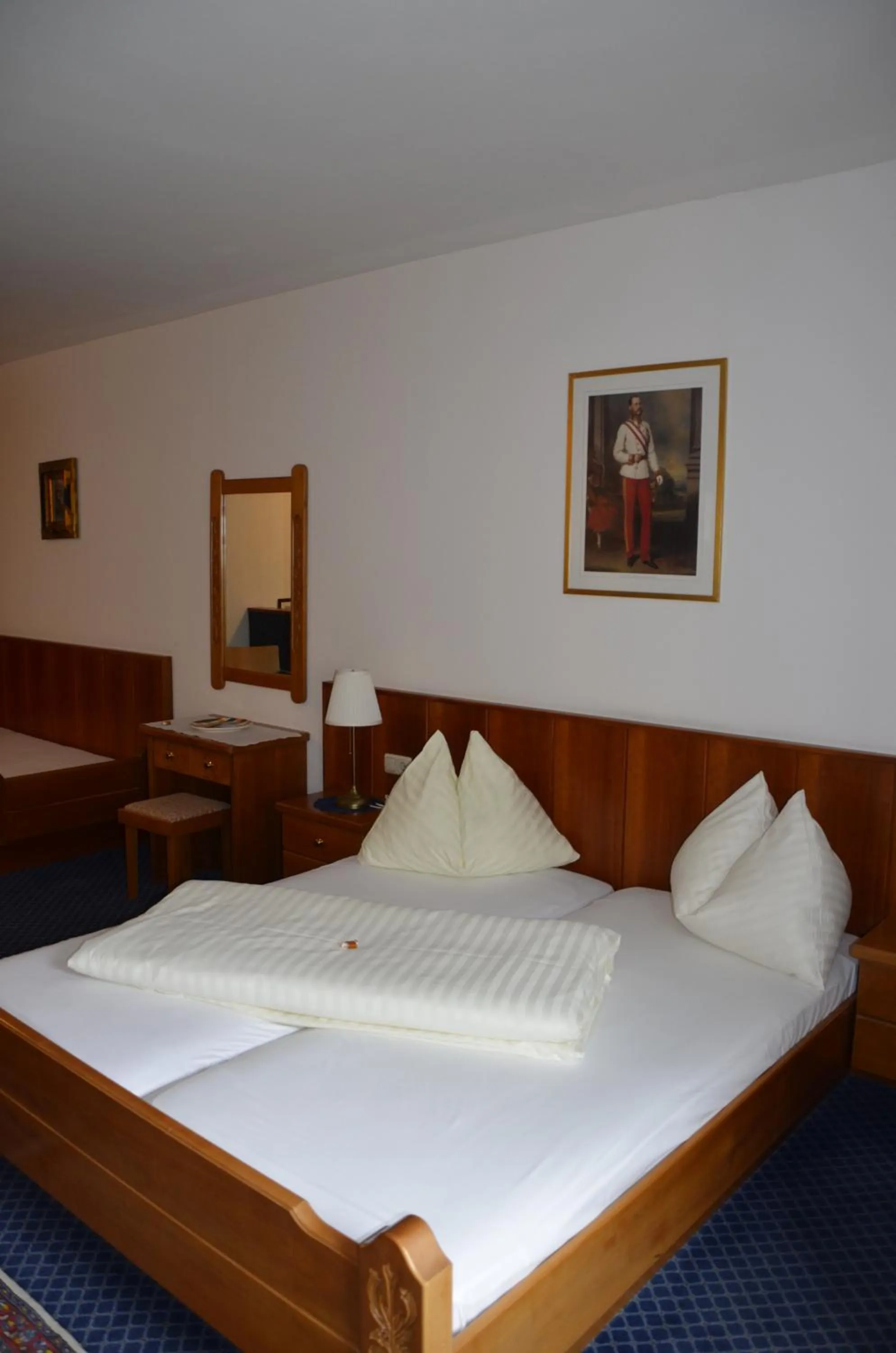 Bed in Cityhotel Ratheiser