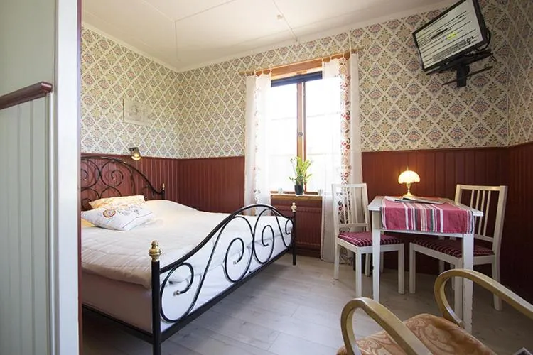 Bed in Prinsgården B&B rum stugor