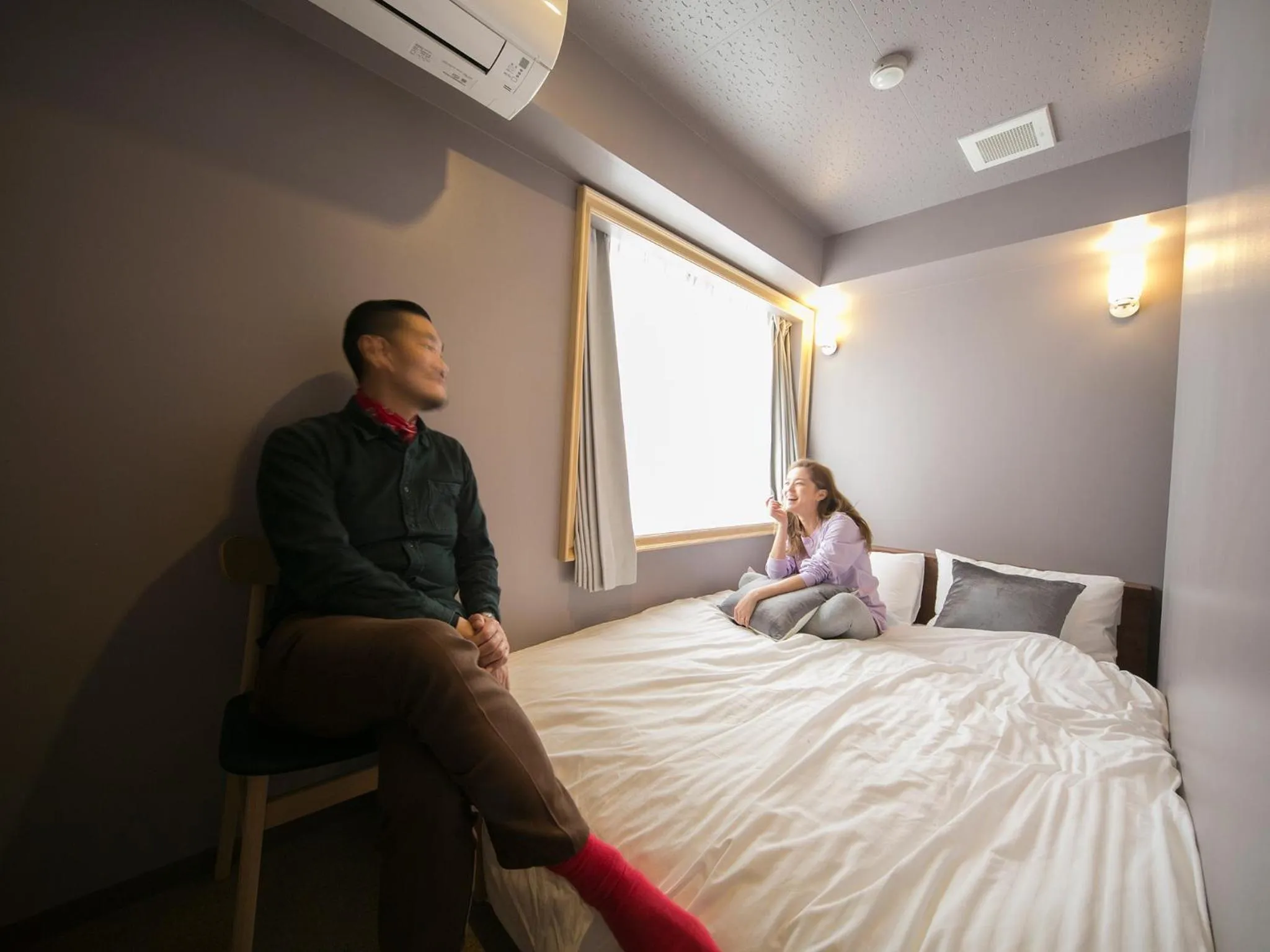 Bed in THE WARDROBE Hotel Shimokitazawa